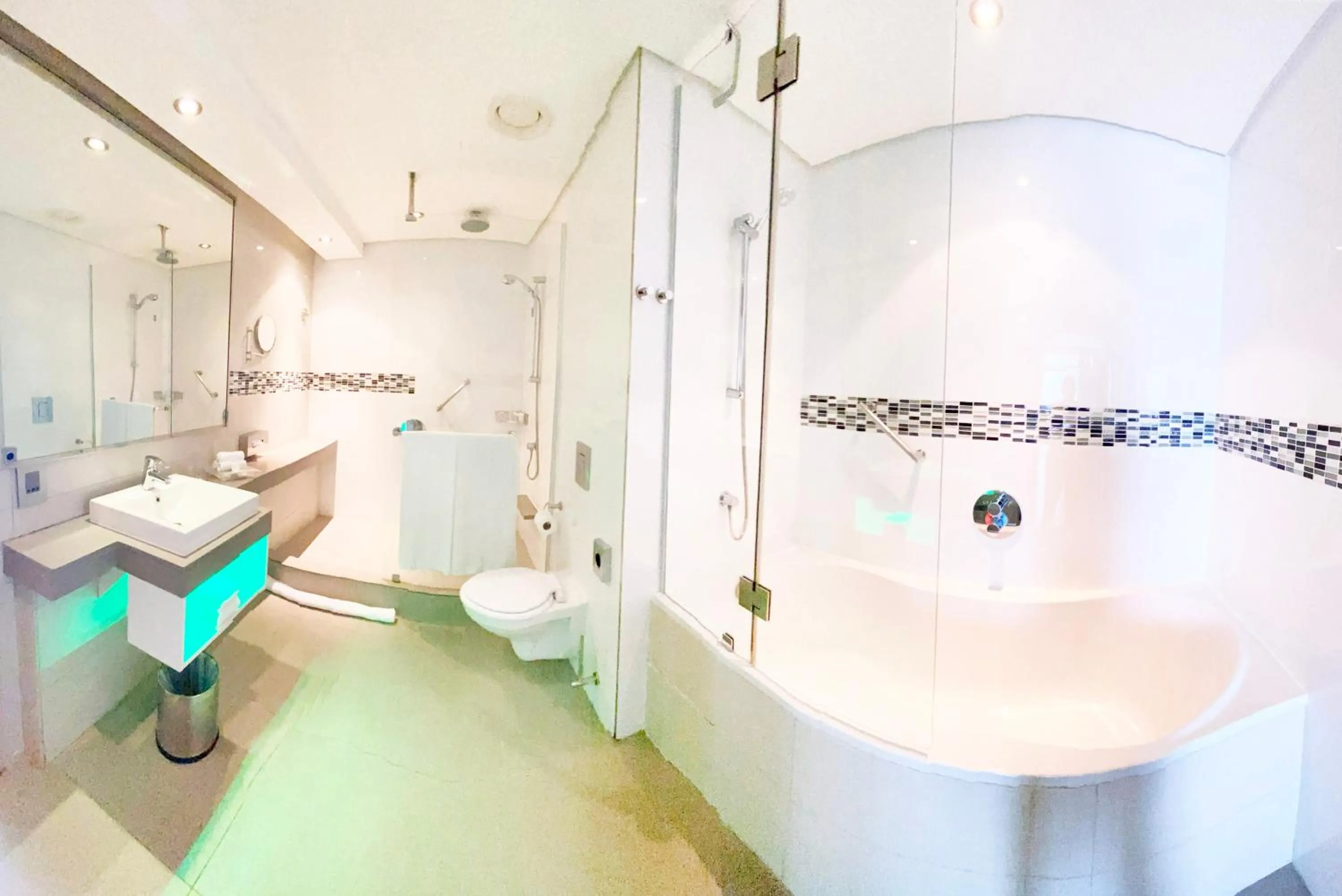 Bathroom in Holiday Inn Mauritius Mon Trésor by IHG