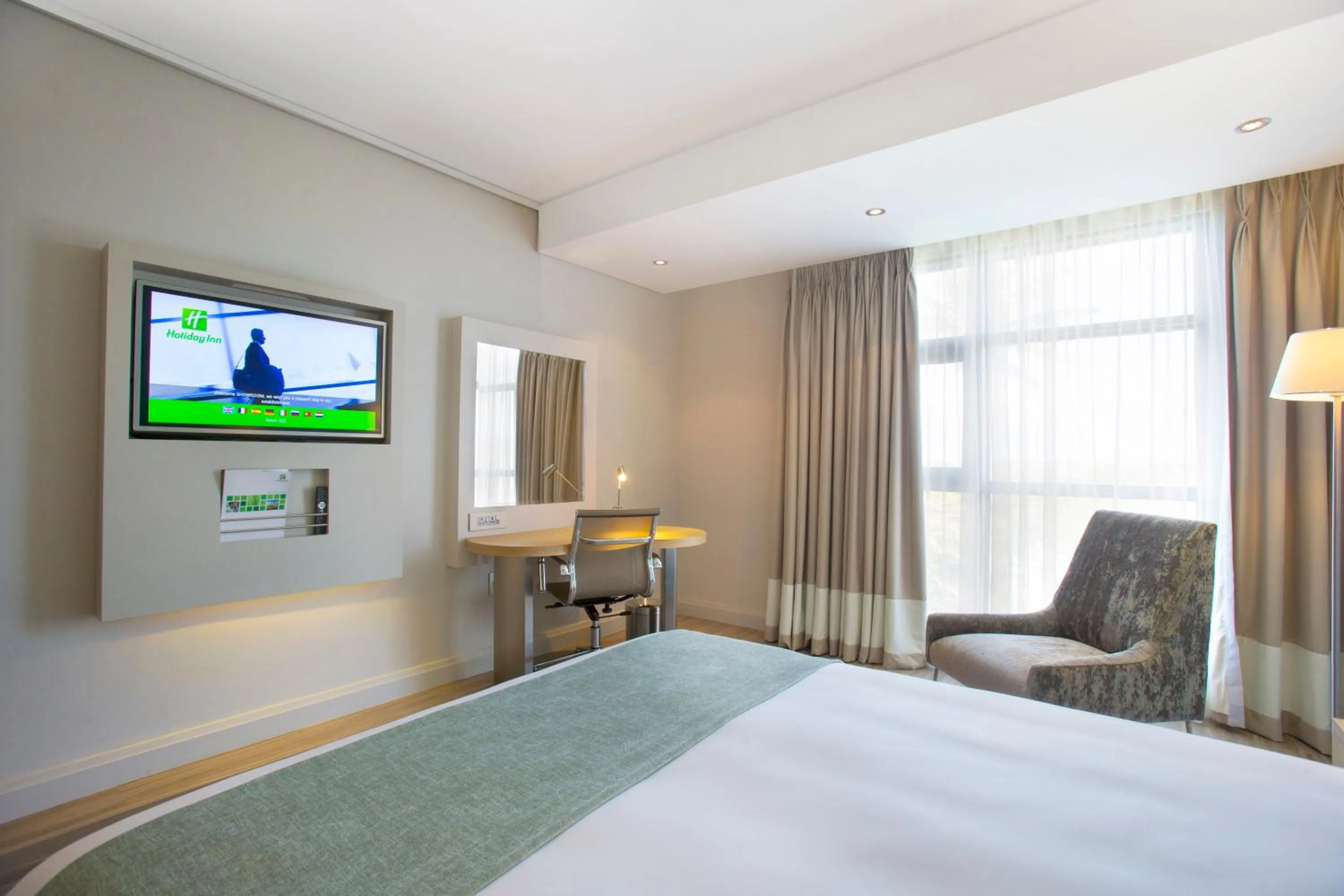 Photo of the whole room, Bed in Holiday Inn Mauritius Mon Trésor by IHG