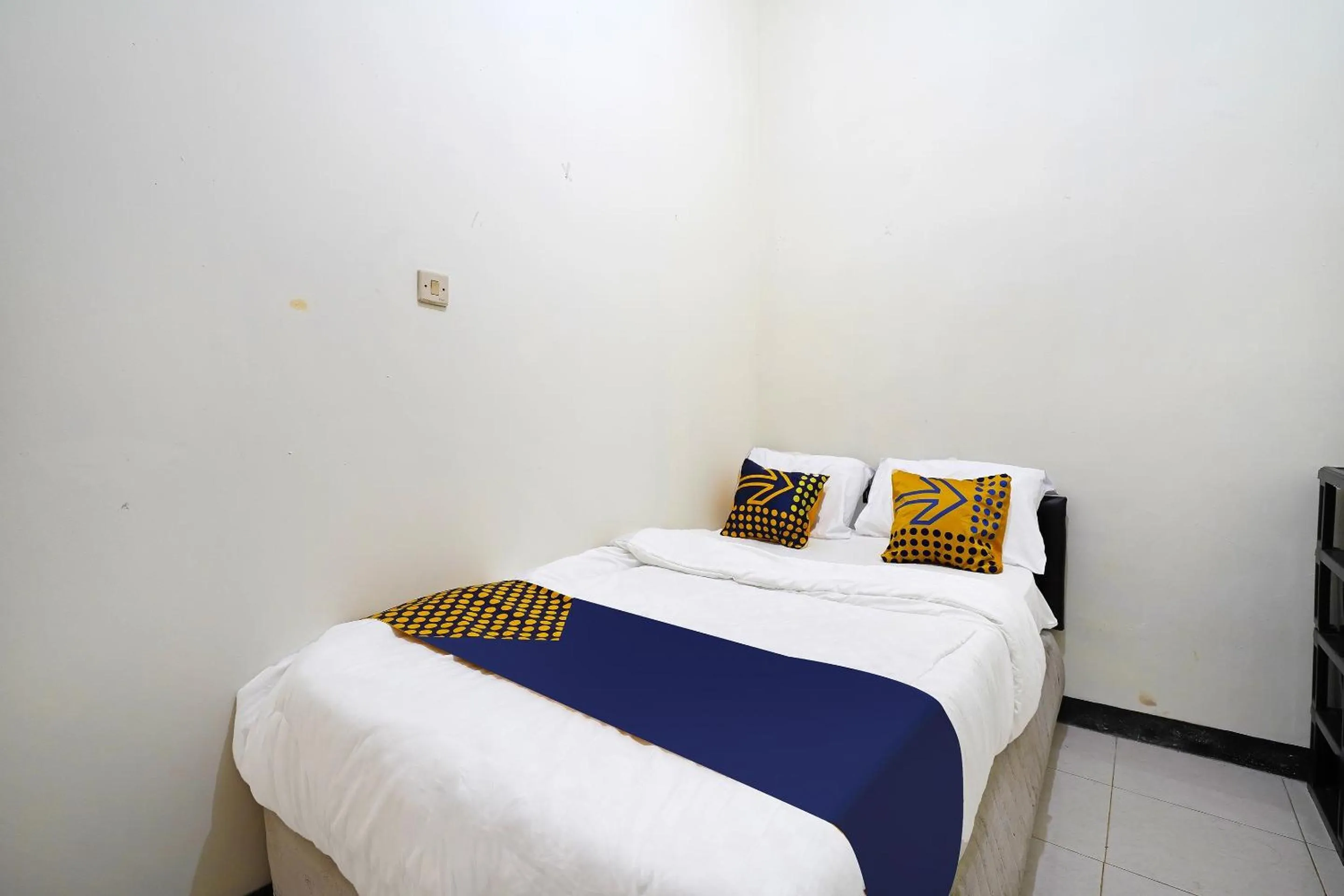 Bedroom in SPOT ON 91394 Pondok Paskal Syariah