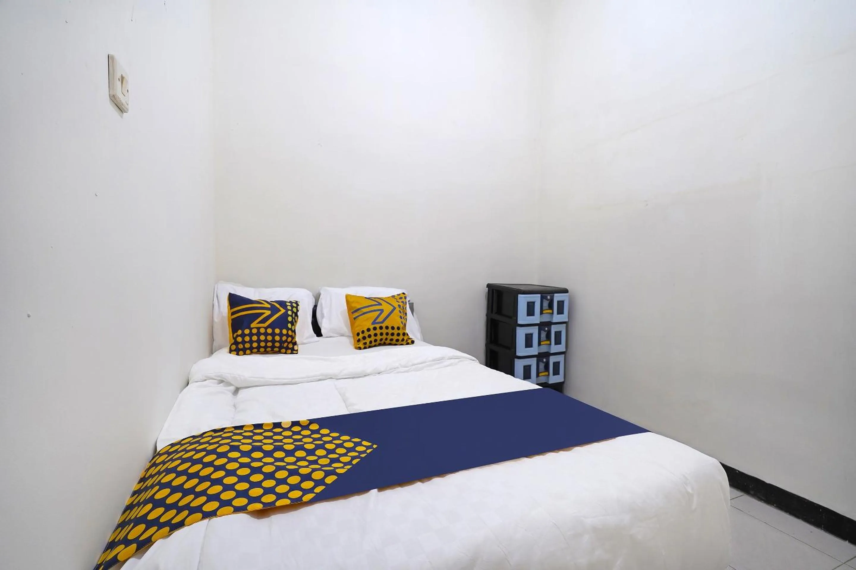 Bedroom in SPOT ON 91394 Pondok Paskal Syariah