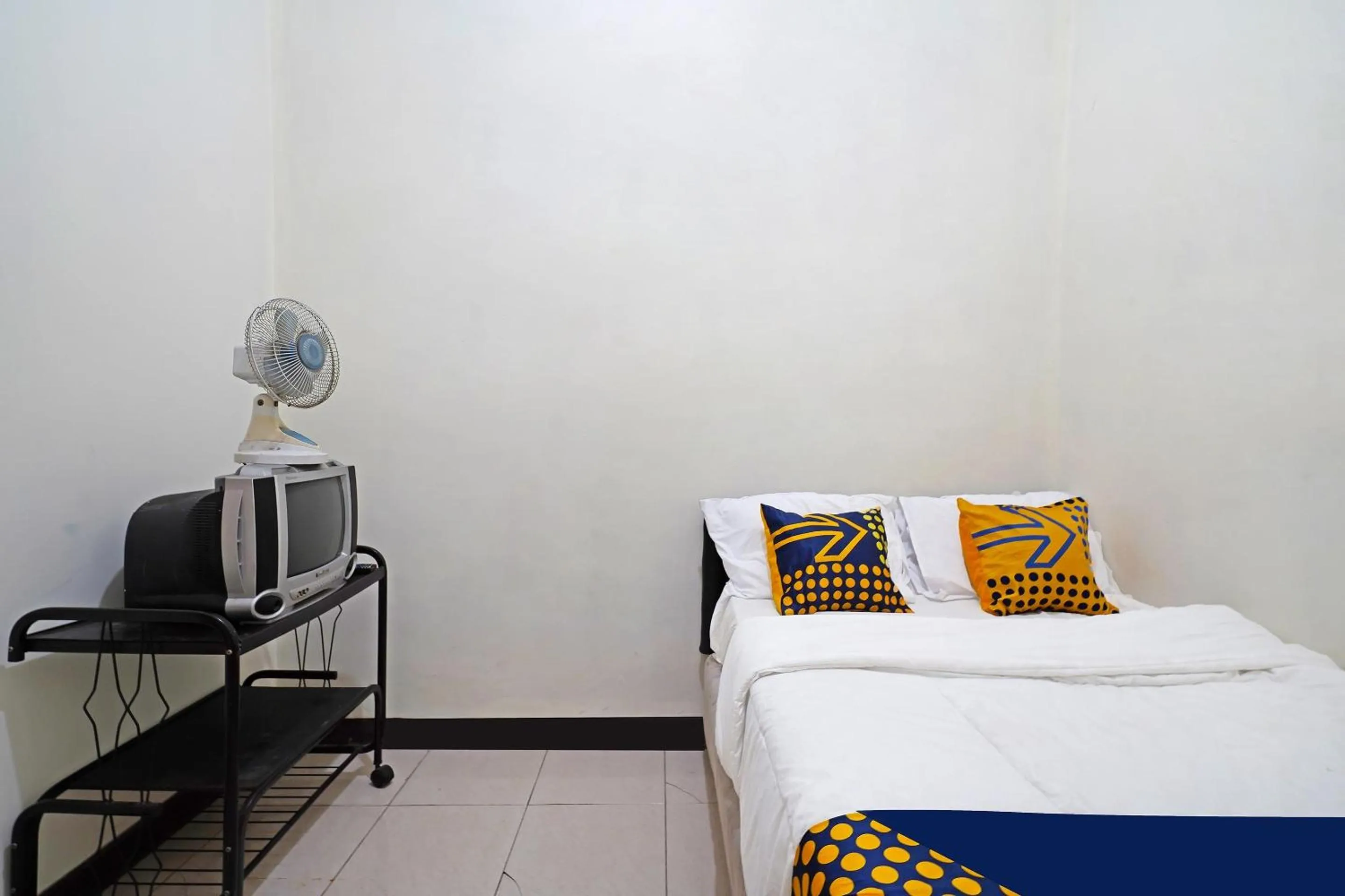 Bedroom in SPOT ON 91394 Pondok Paskal Syariah