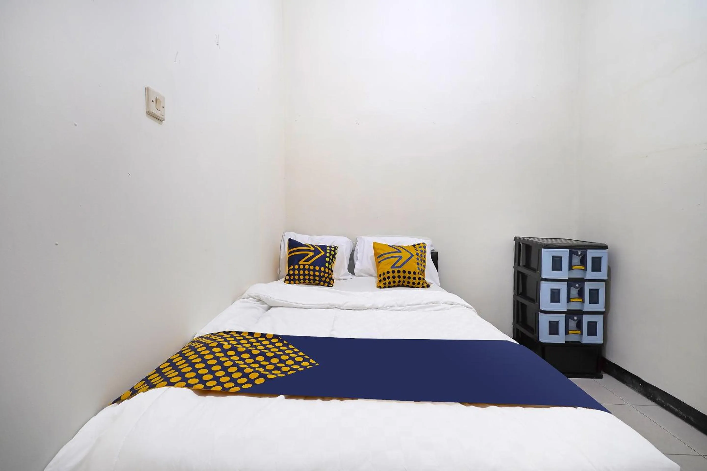 Bedroom in SPOT ON 91394 Pondok Paskal Syariah