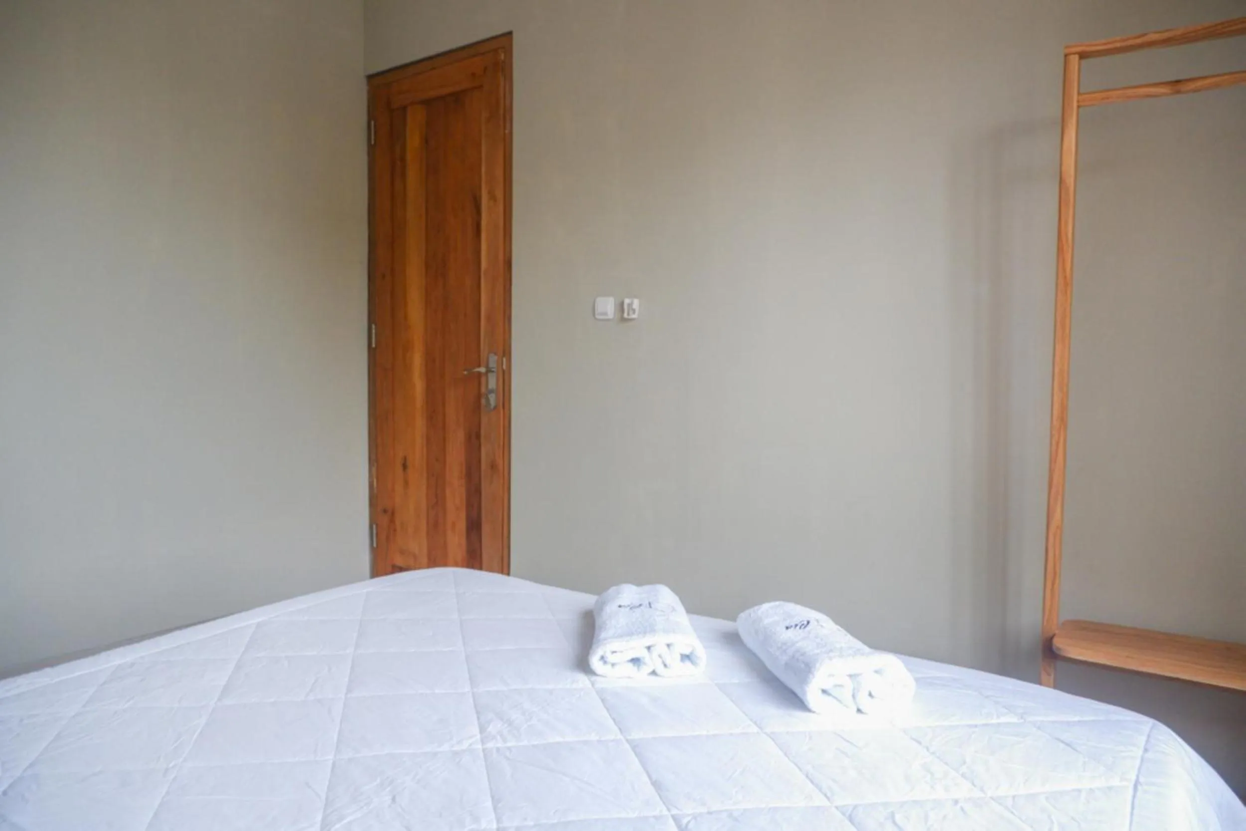 Bedroom, Bed in RedDoorz Syariah near Tugu Pandanwangi Cianjur