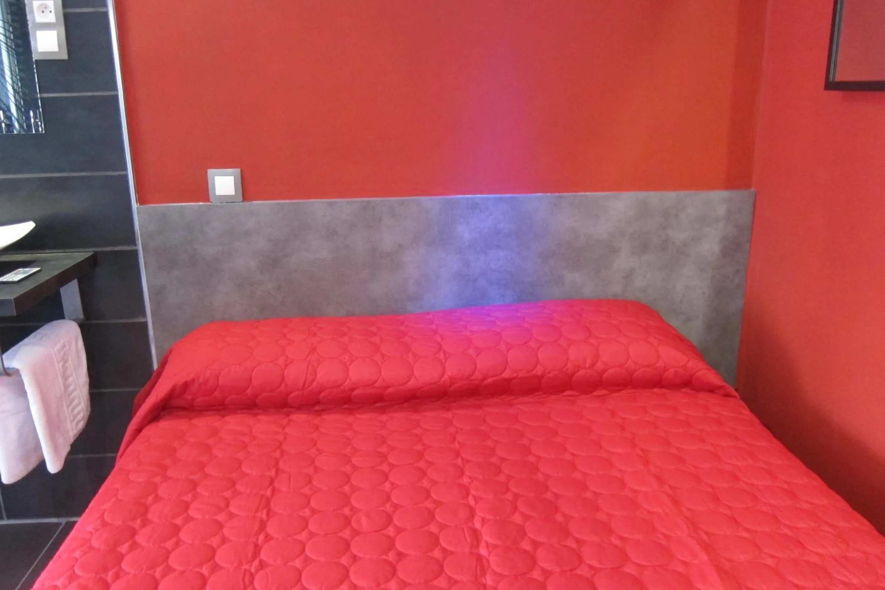 Bed in Studios Port Nature village Naturiste