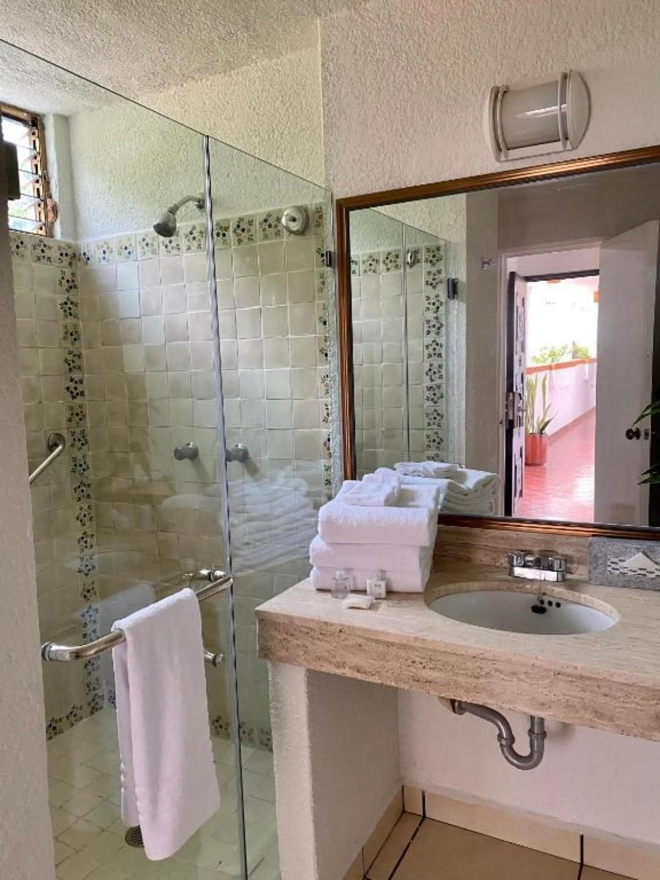 Bathroom in Costa Sur Resort by VRHost
