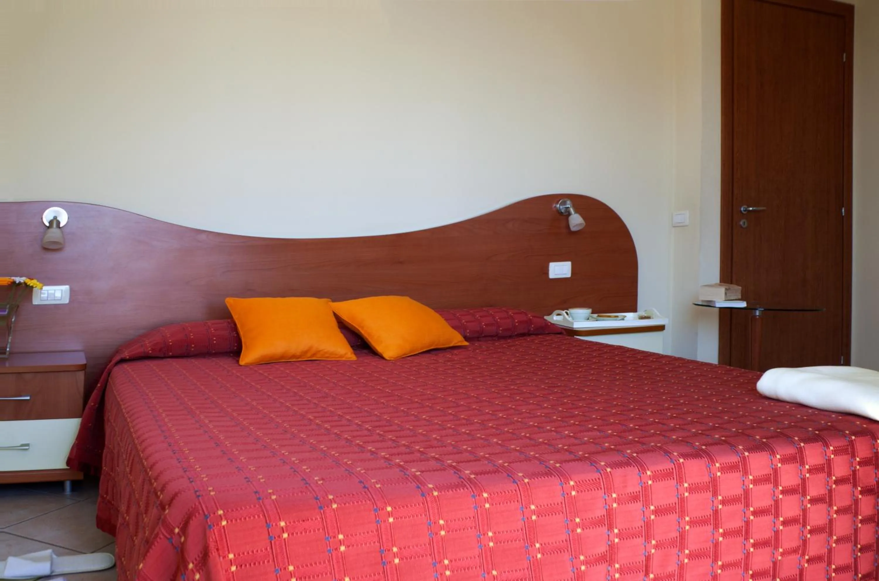 Bed in Motta Residence Hotel