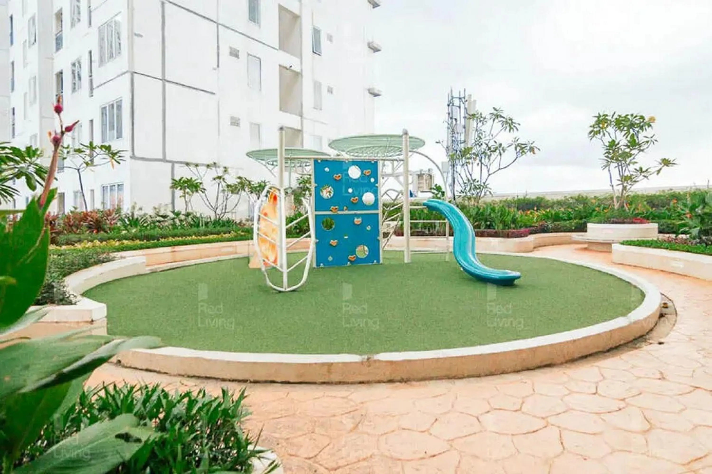 Children play ground in RedLiving Apartemen Bassura City - Byrin Property Tower Heliconia