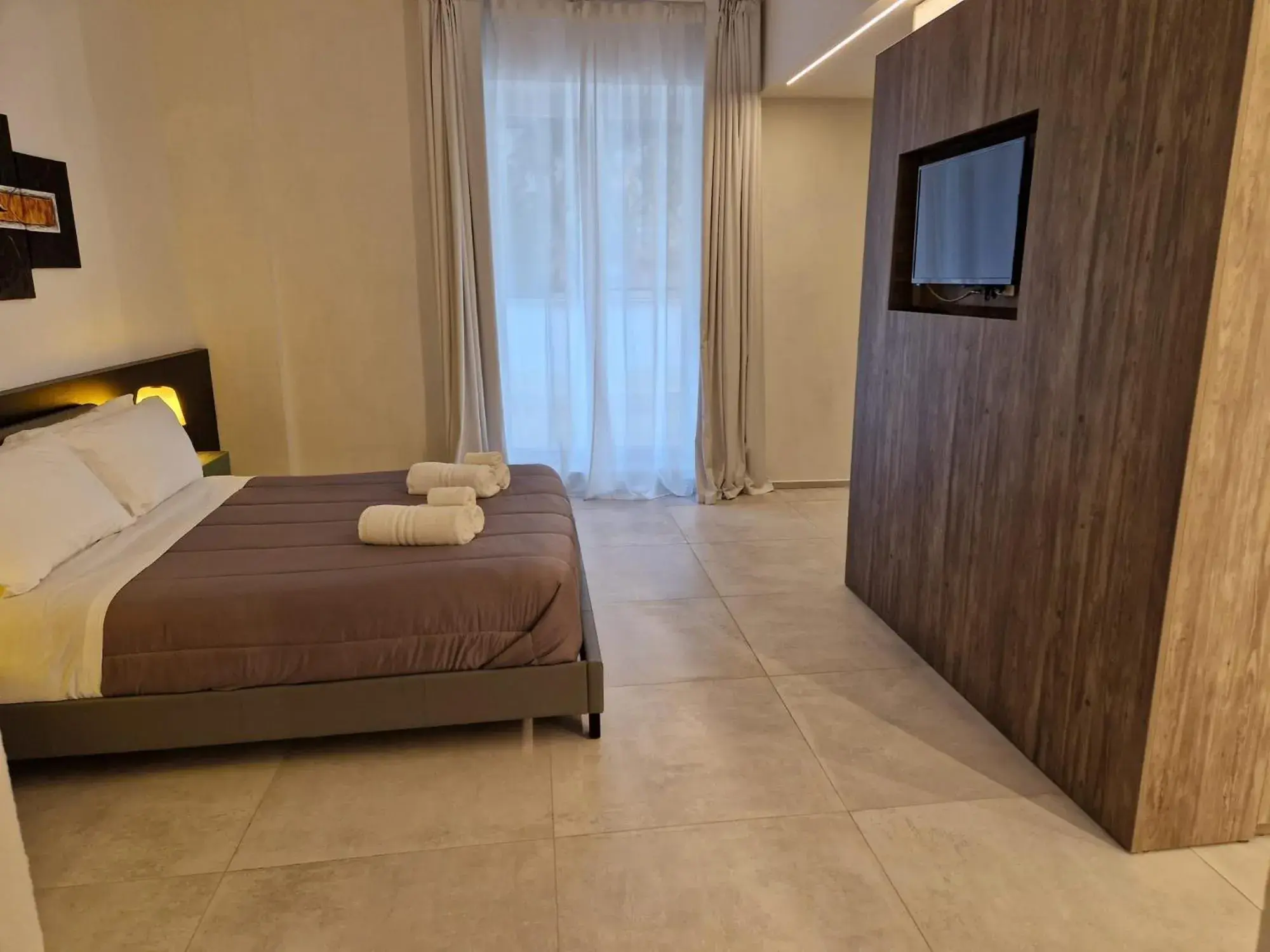 Quadruple Room in Korè Hotel Quadruple Room in Korè Hotel