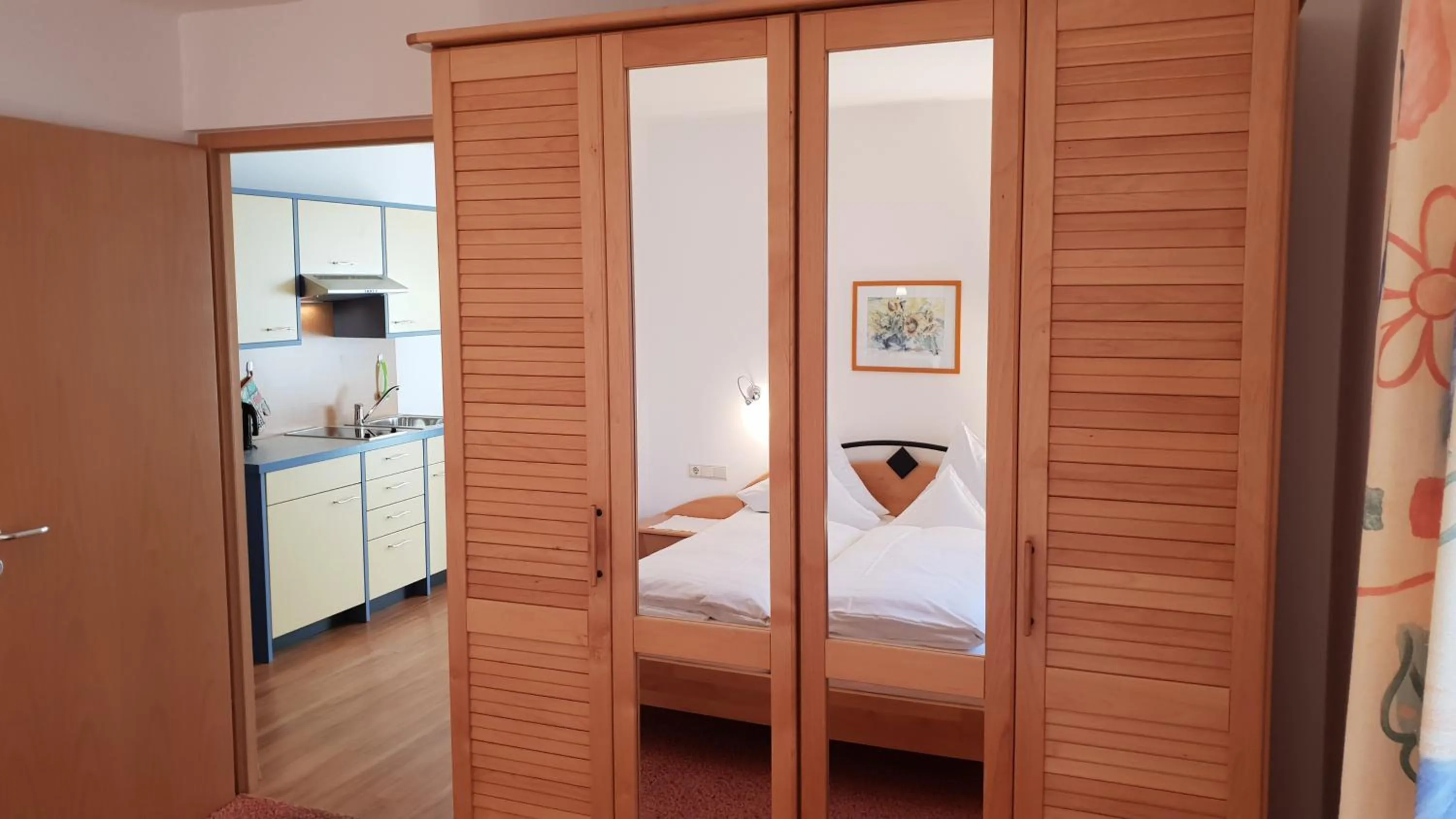wardrobe, Bed in Appartements Dornach