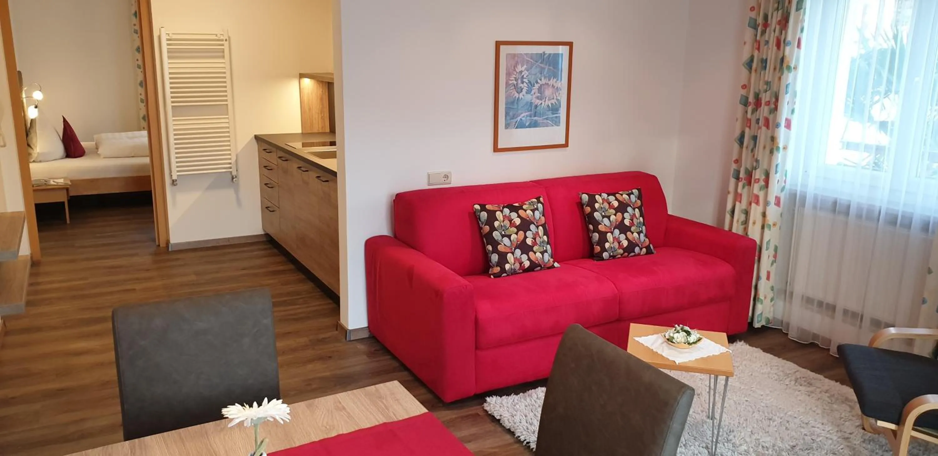 Kitchen or kitchenette, Bed in Appartements Dornach