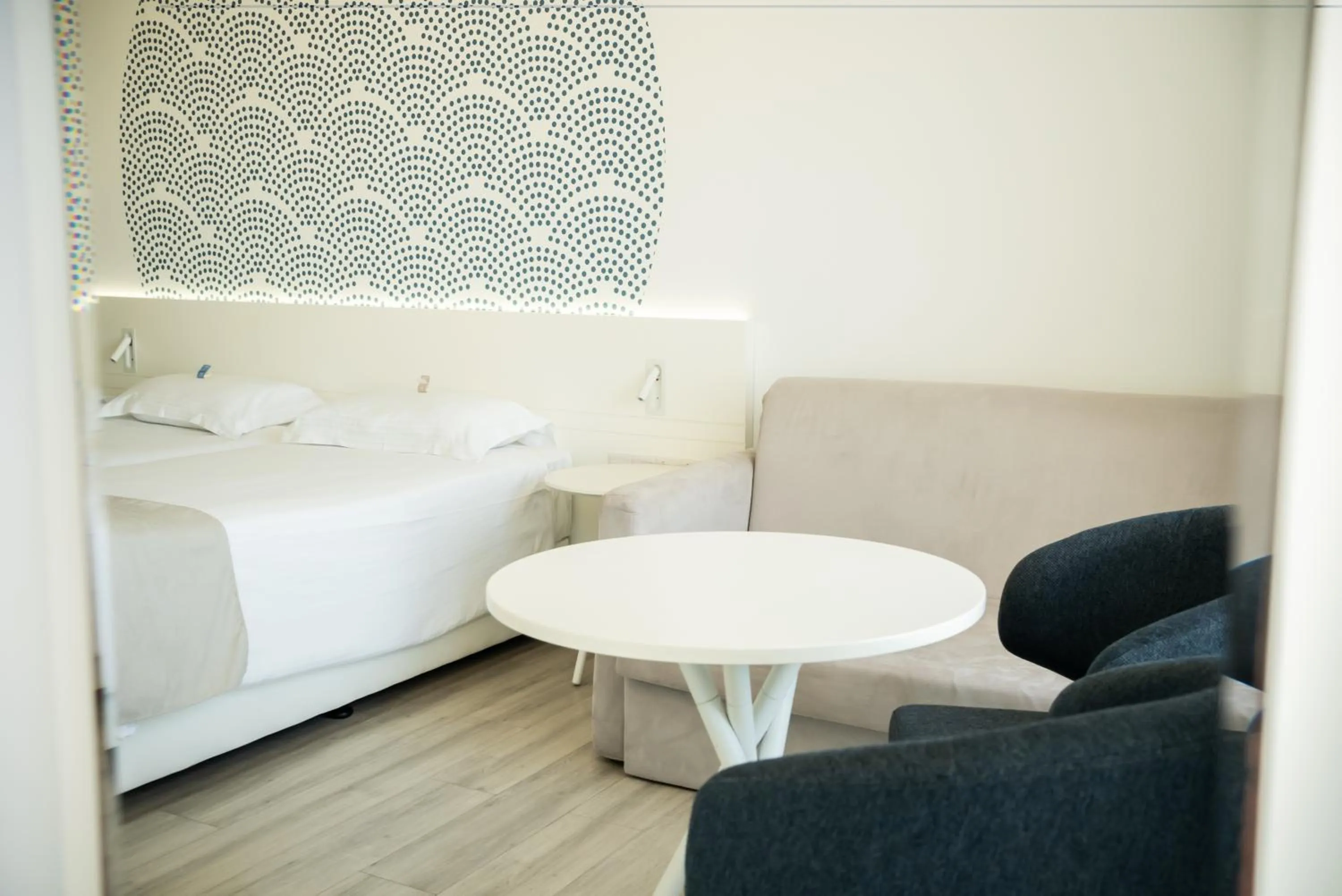 Seating area, Bed in MARGADINA HOTEL