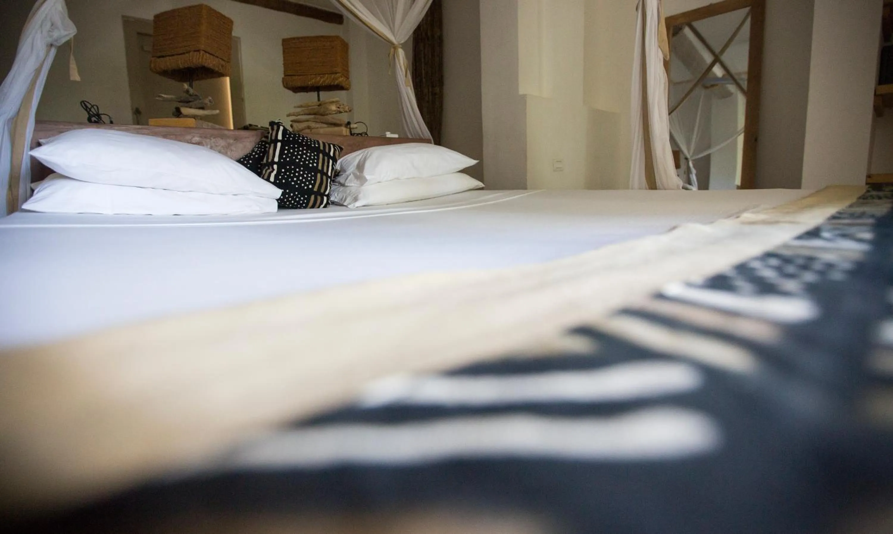 Bed in Uzuri Boutique Hotel