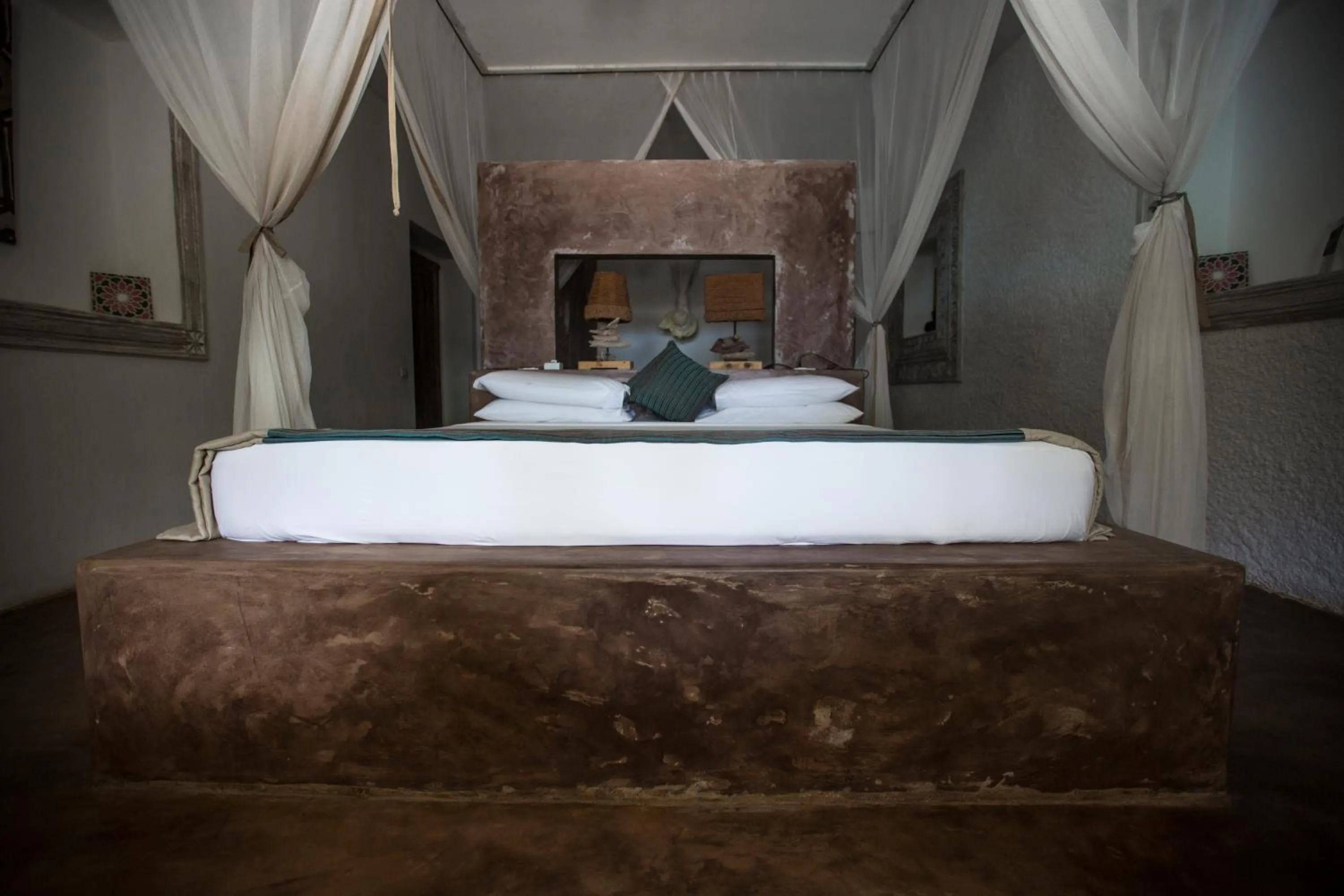 Bed in Uzuri Boutique Hotel