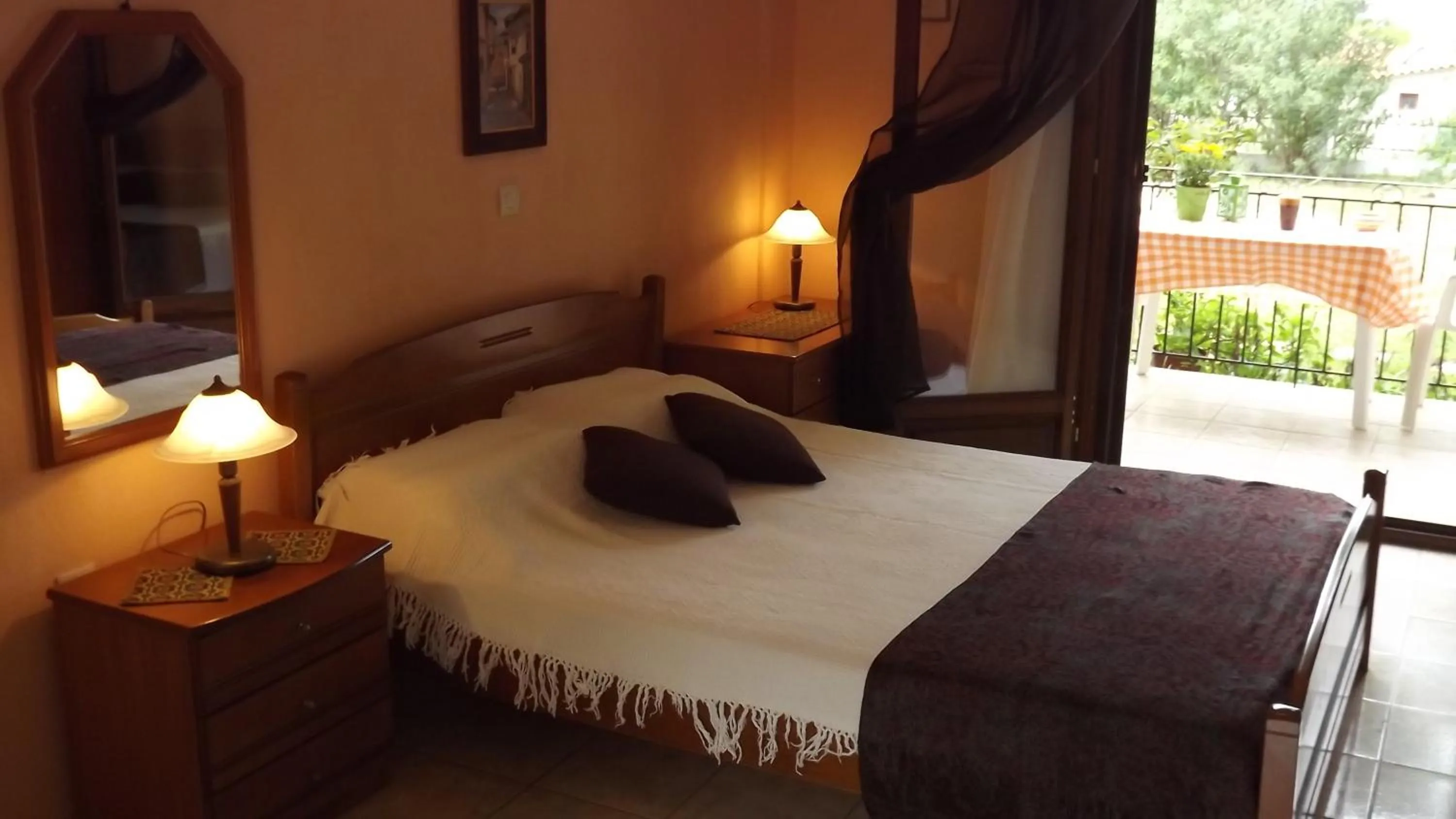 Bed in Pefka Studios & Apartments