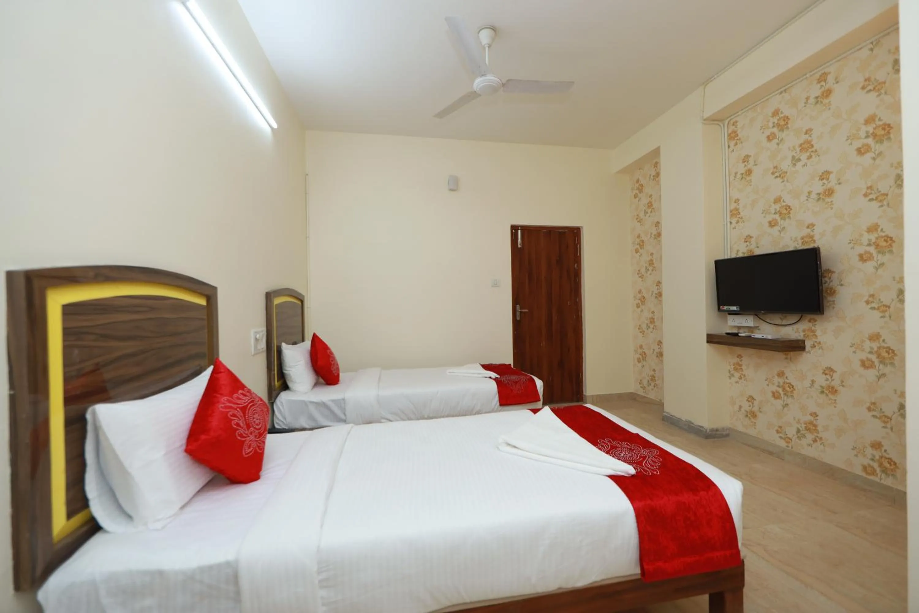 Photo of the whole room in Hotel Amulya Relax Inn