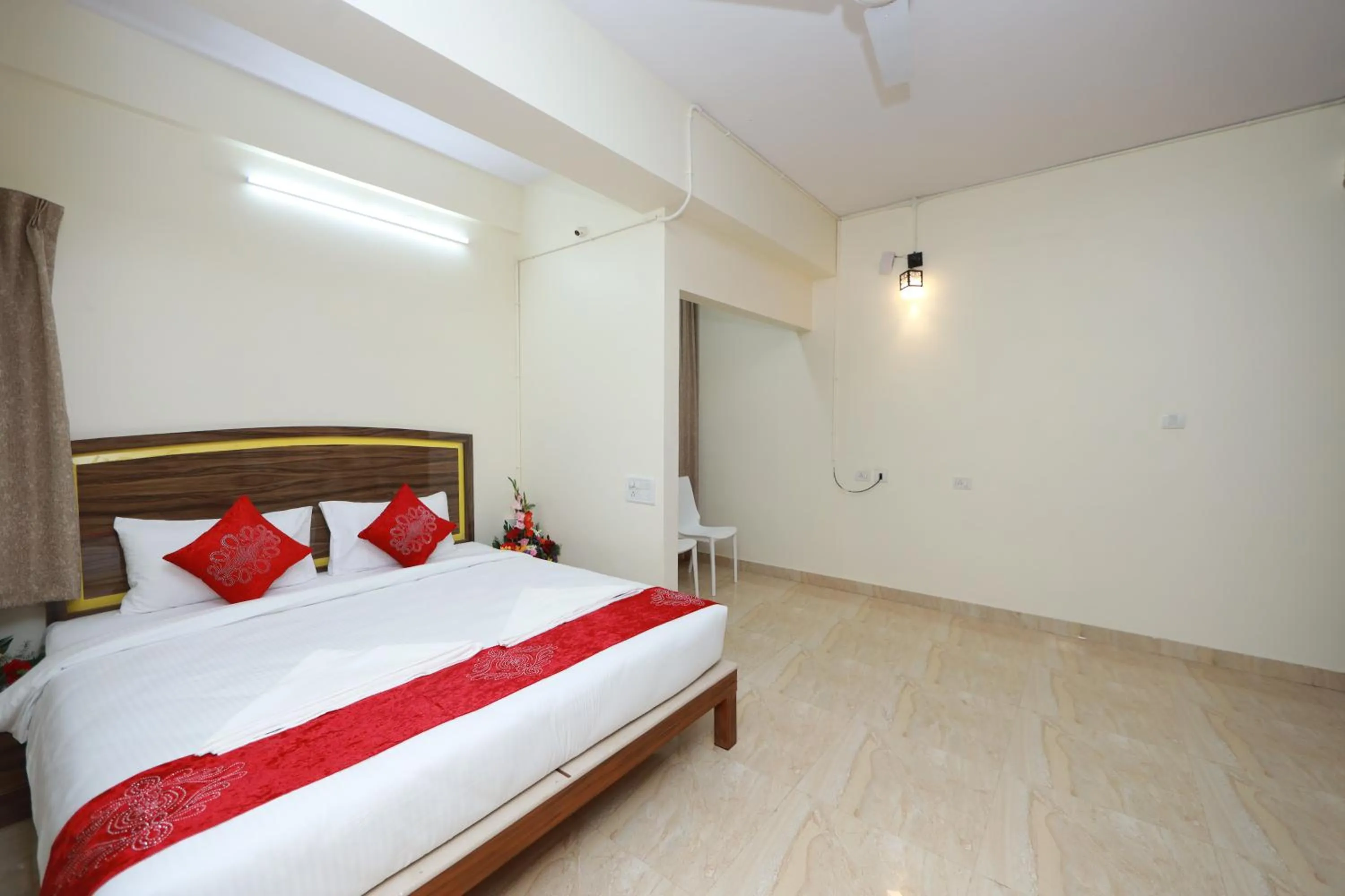 Bed in Hotel Amulya Relax Inn