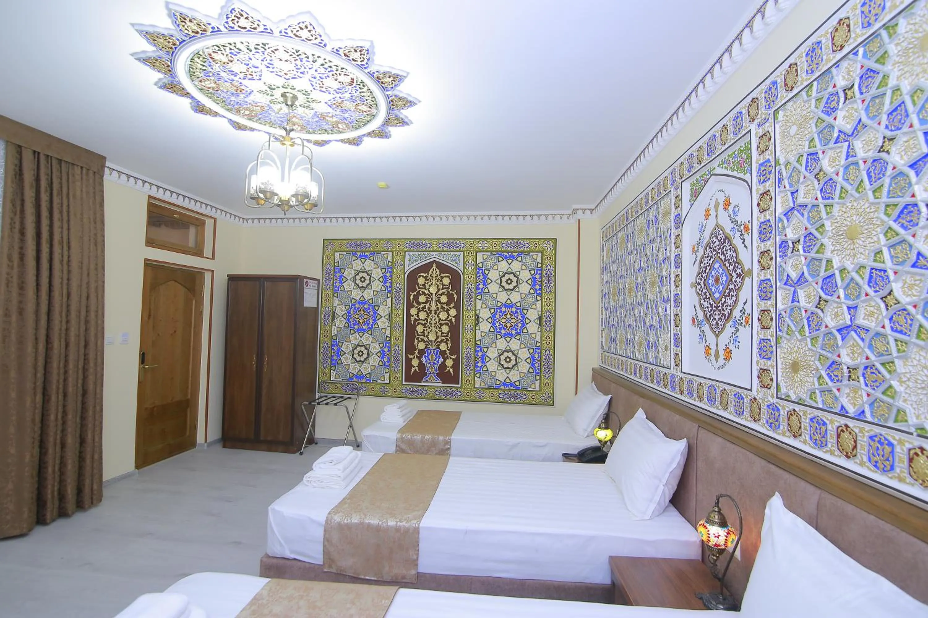 Bed in Sahar Boutique Hotel