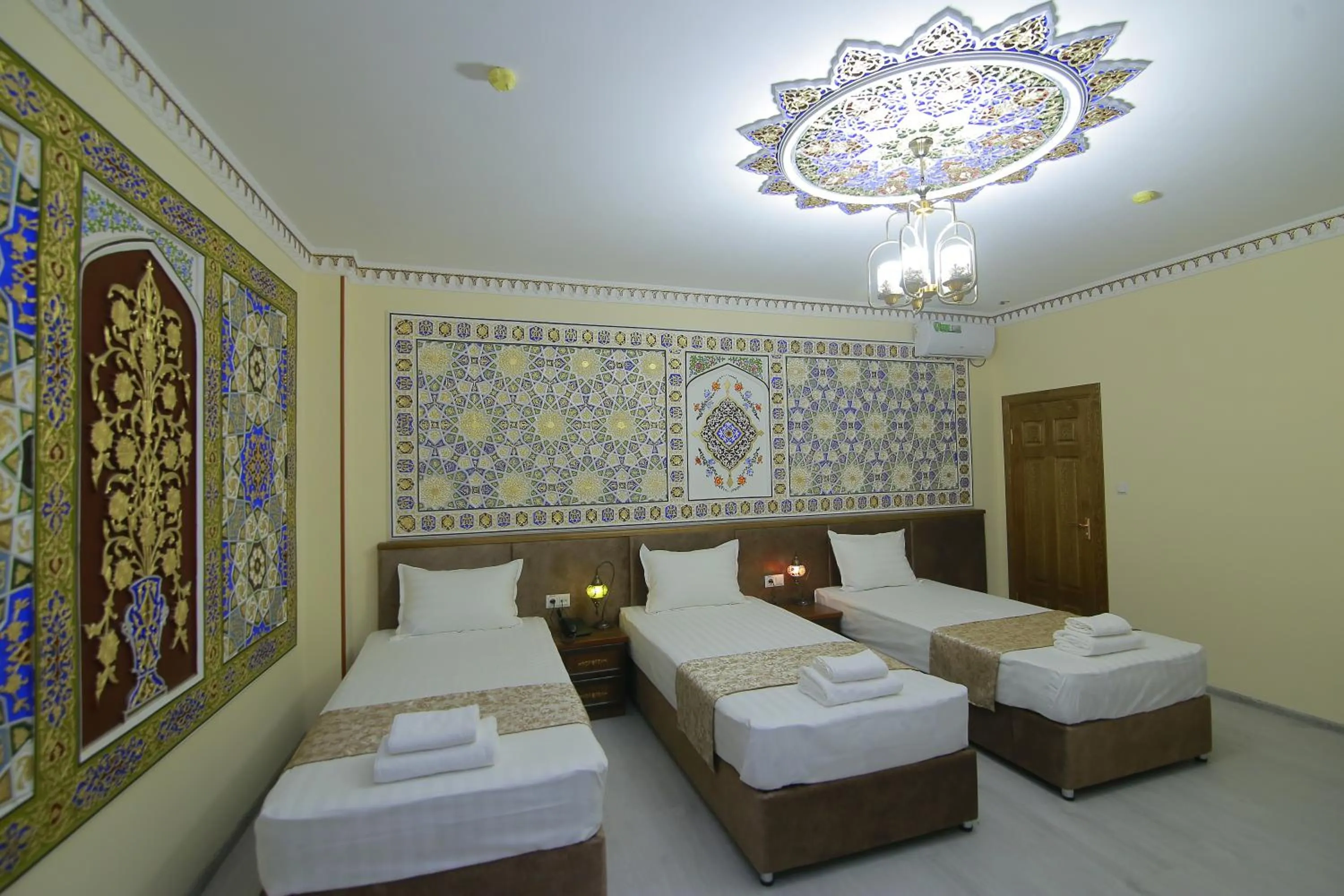Bed in Sahar Boutique Hotel