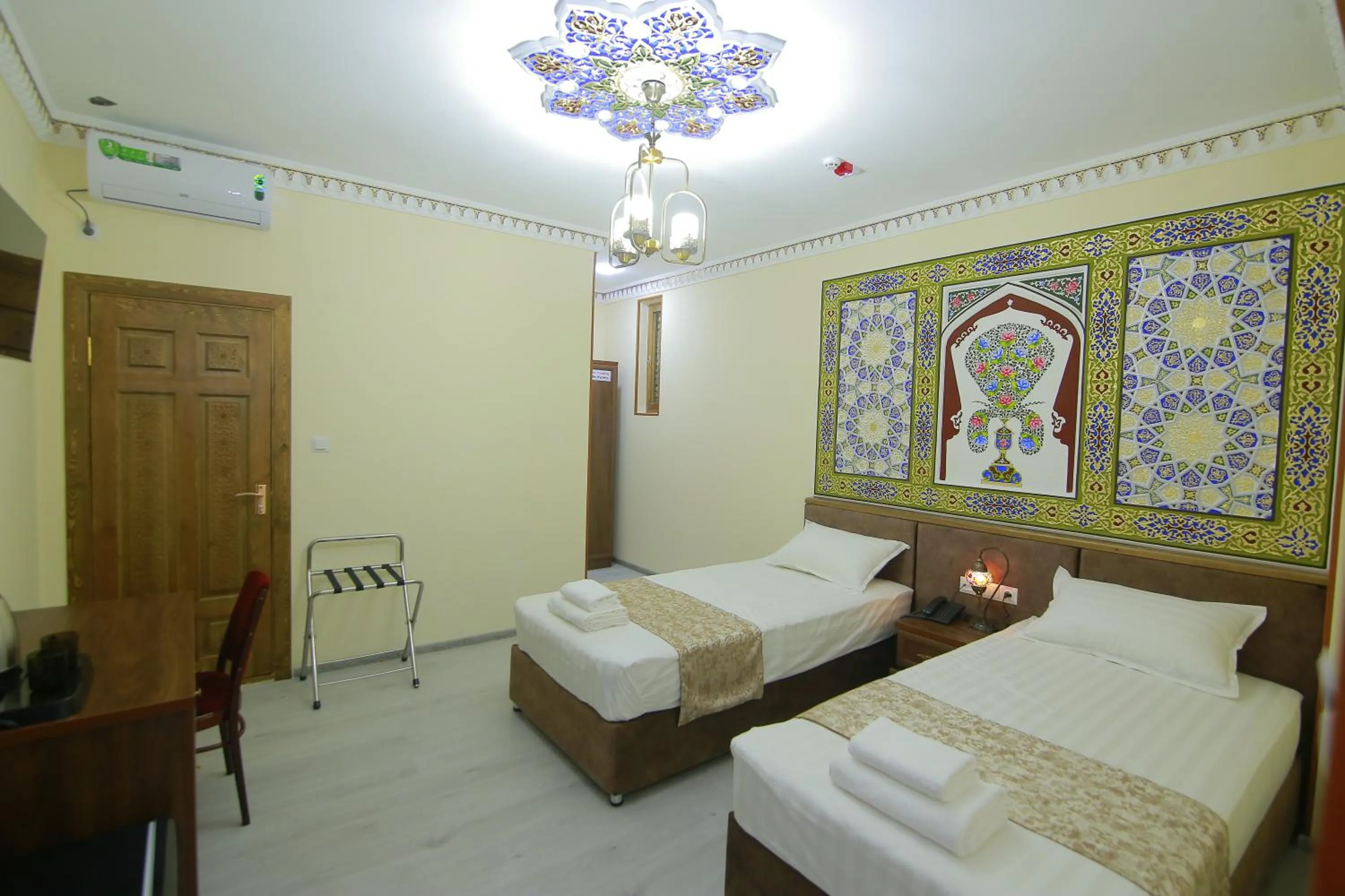 Bed in Sahar Boutique Hotel