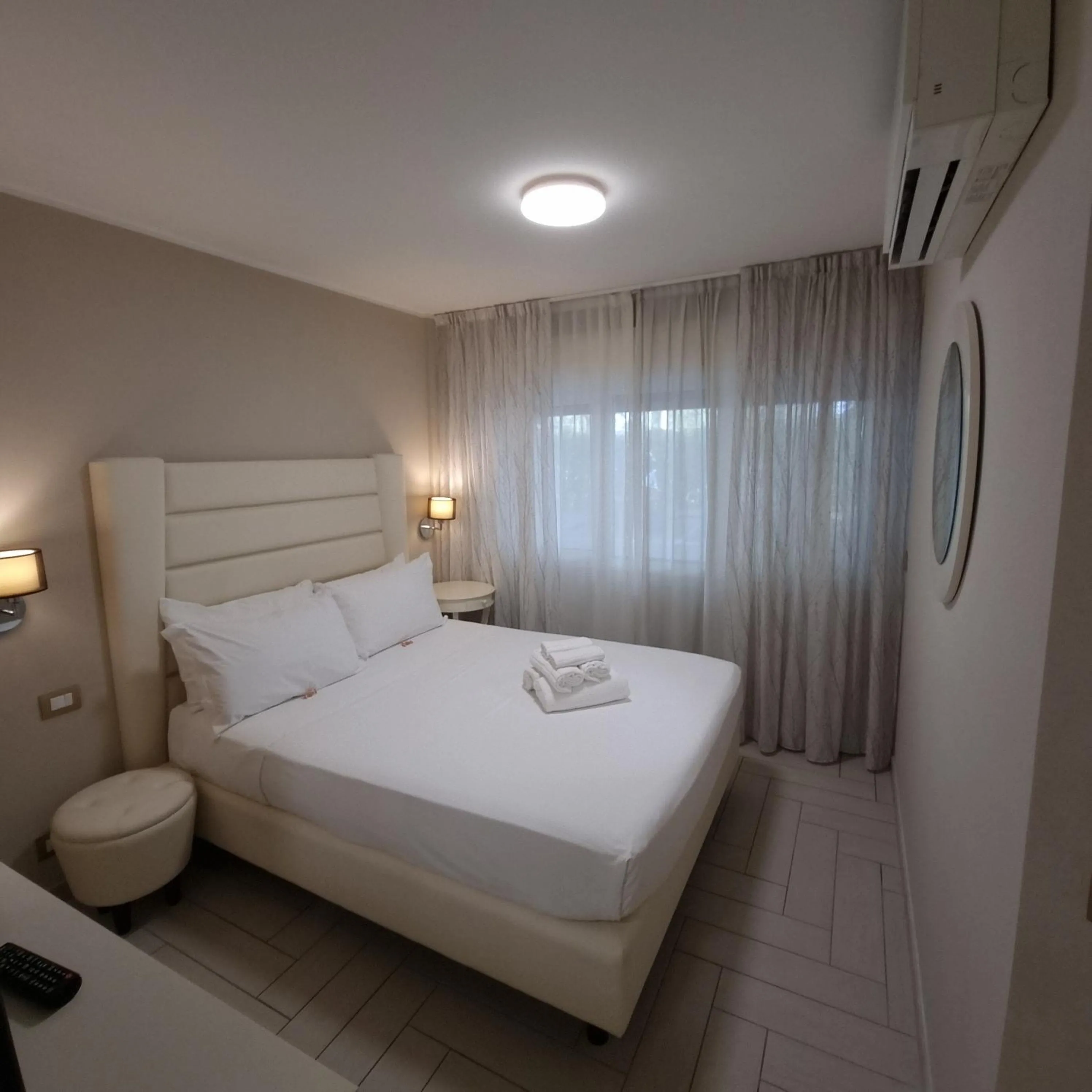 Bed in Nero D'Avorio Apartments