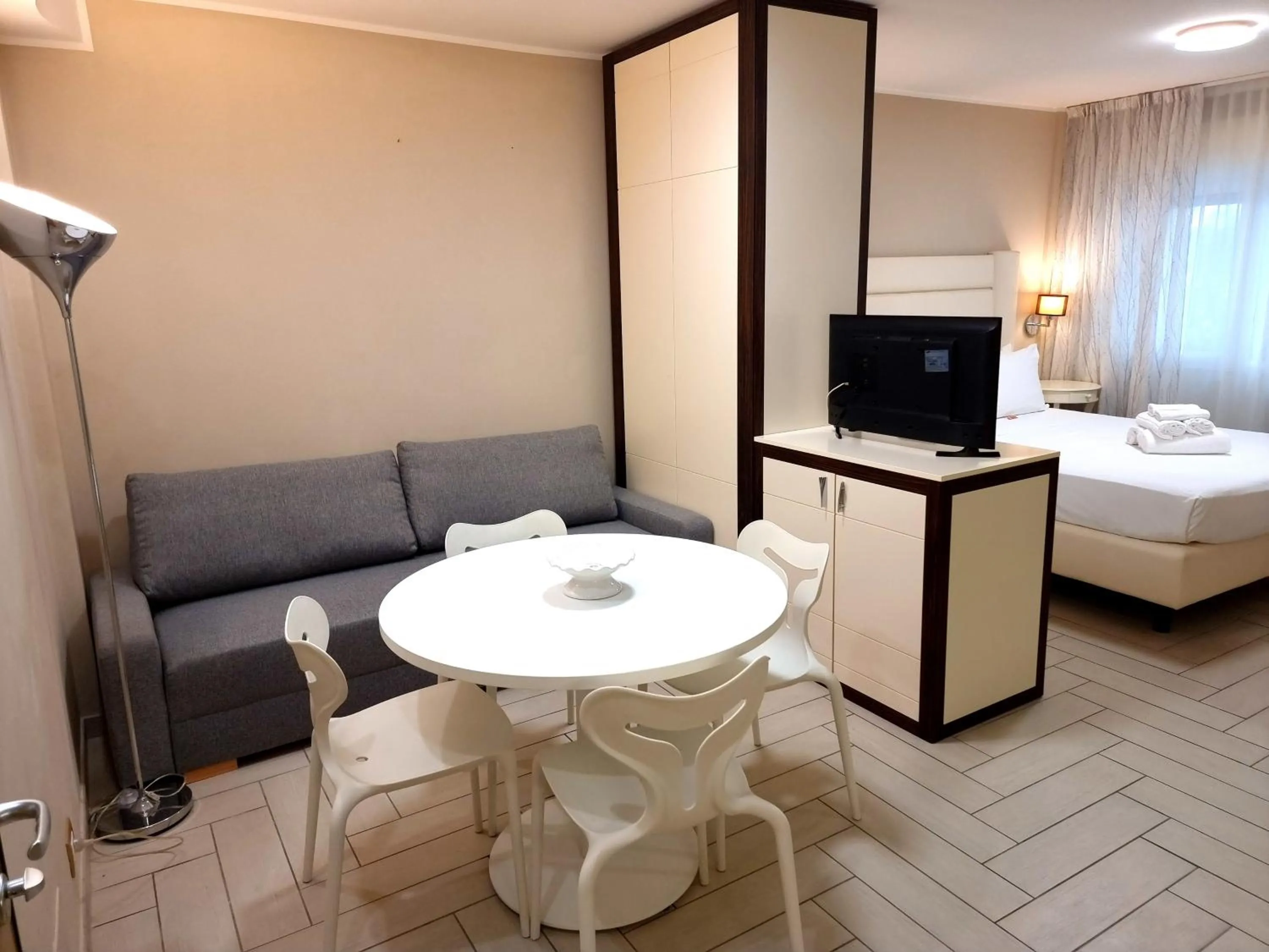 Living room, Bed in Nero D'Avorio Apartments