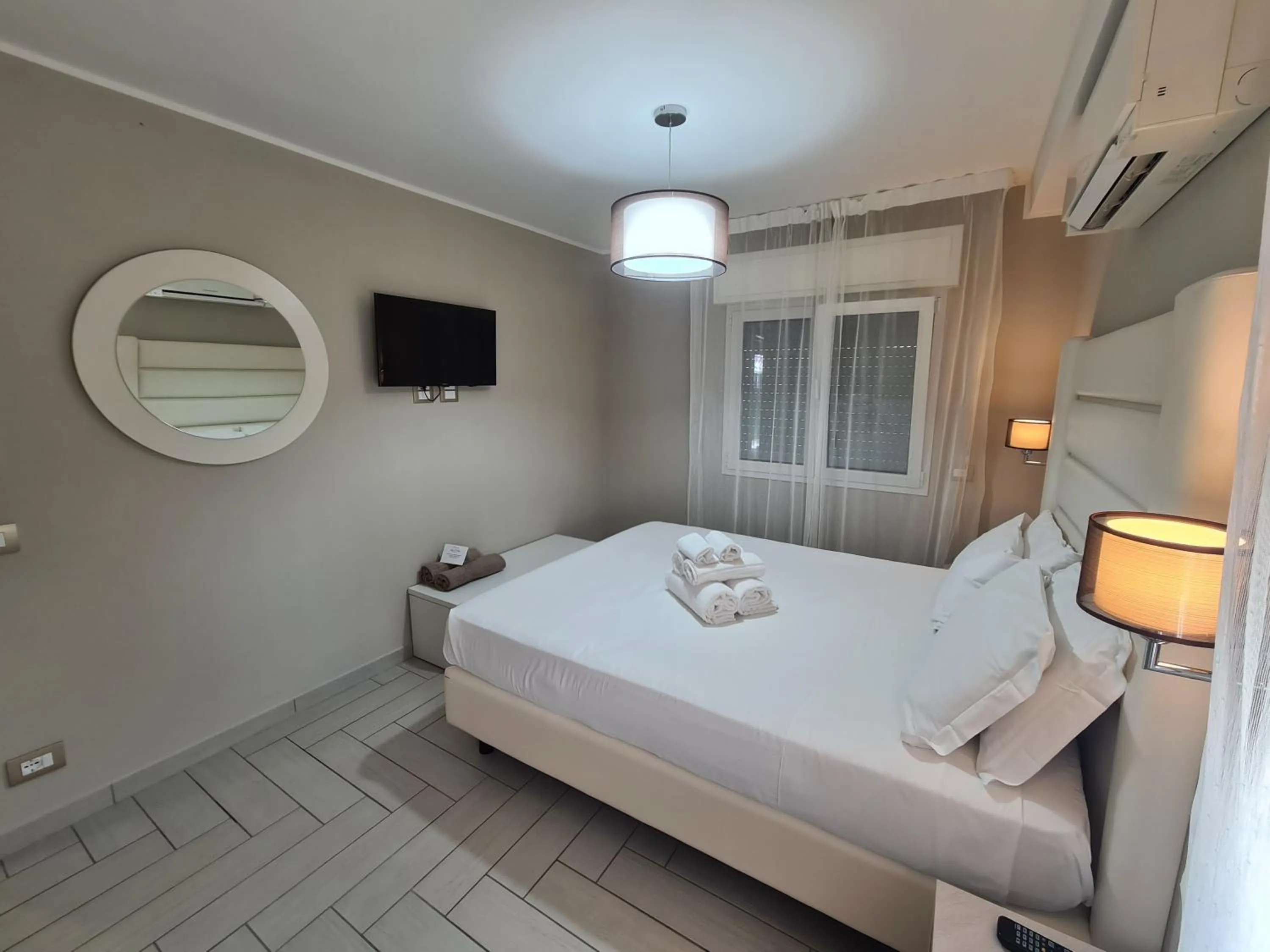 Bed in Nero D'Avorio Apartments