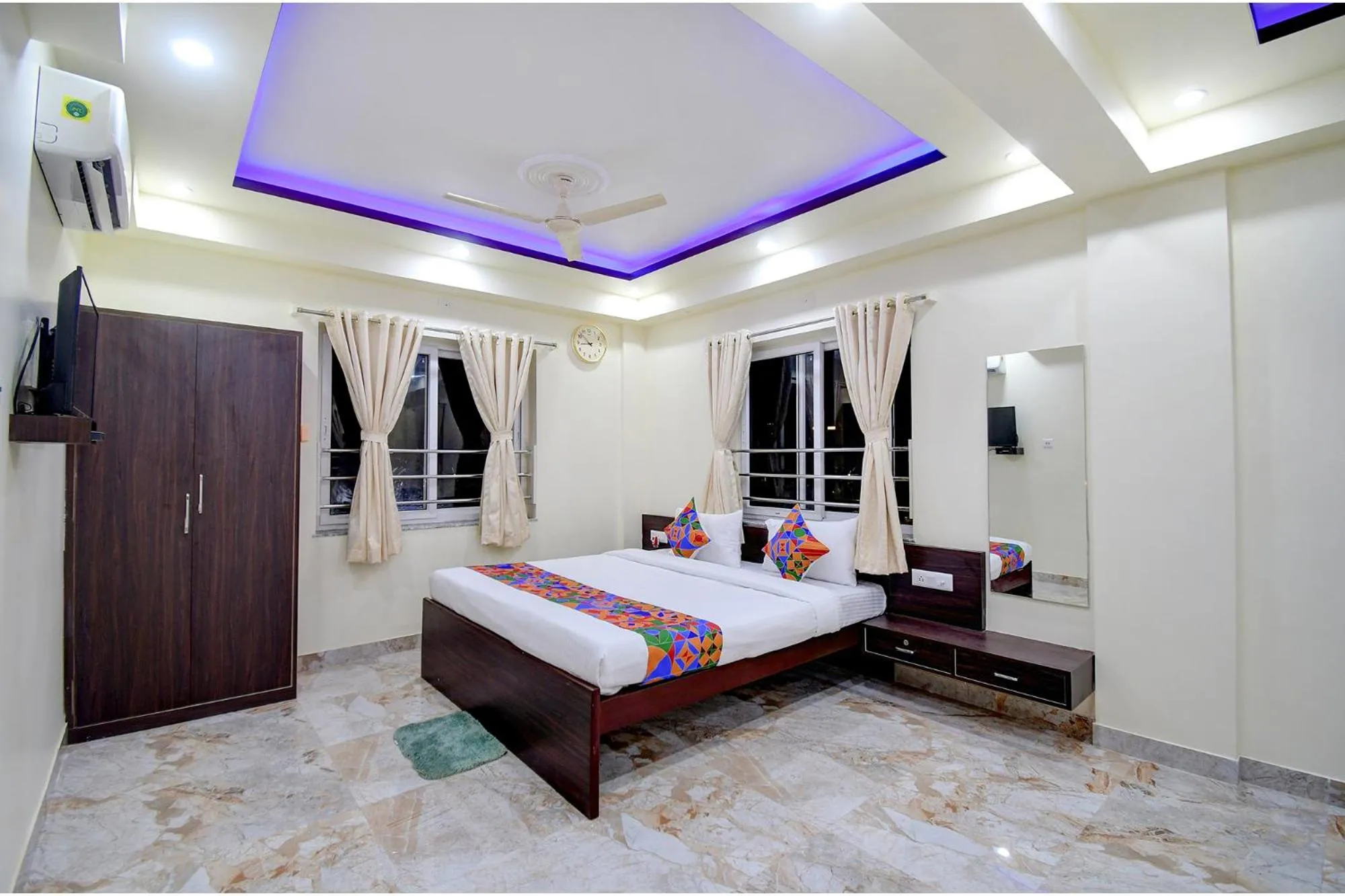 Bed in FabHotel Anchorage Inn - Nr Axis Mall