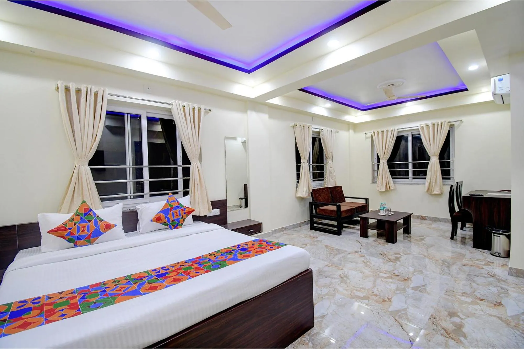 Bed in FabHotel Anchorage Inn - Nr Axis Mall