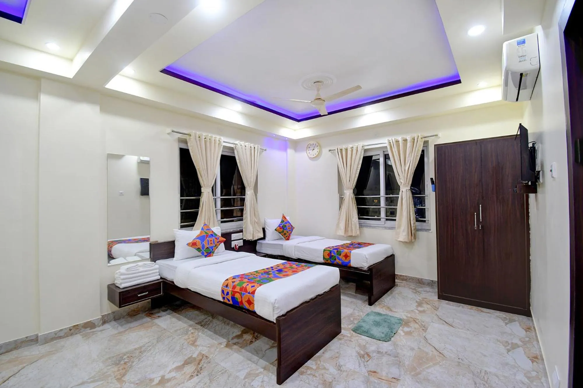 Bed in FabHotel Anchorage Inn - Nr Axis Mall