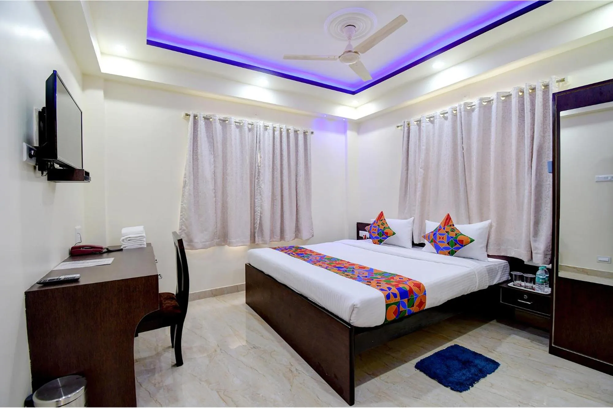 Bed in FabHotel Anchorage Inn - Nr Axis Mall