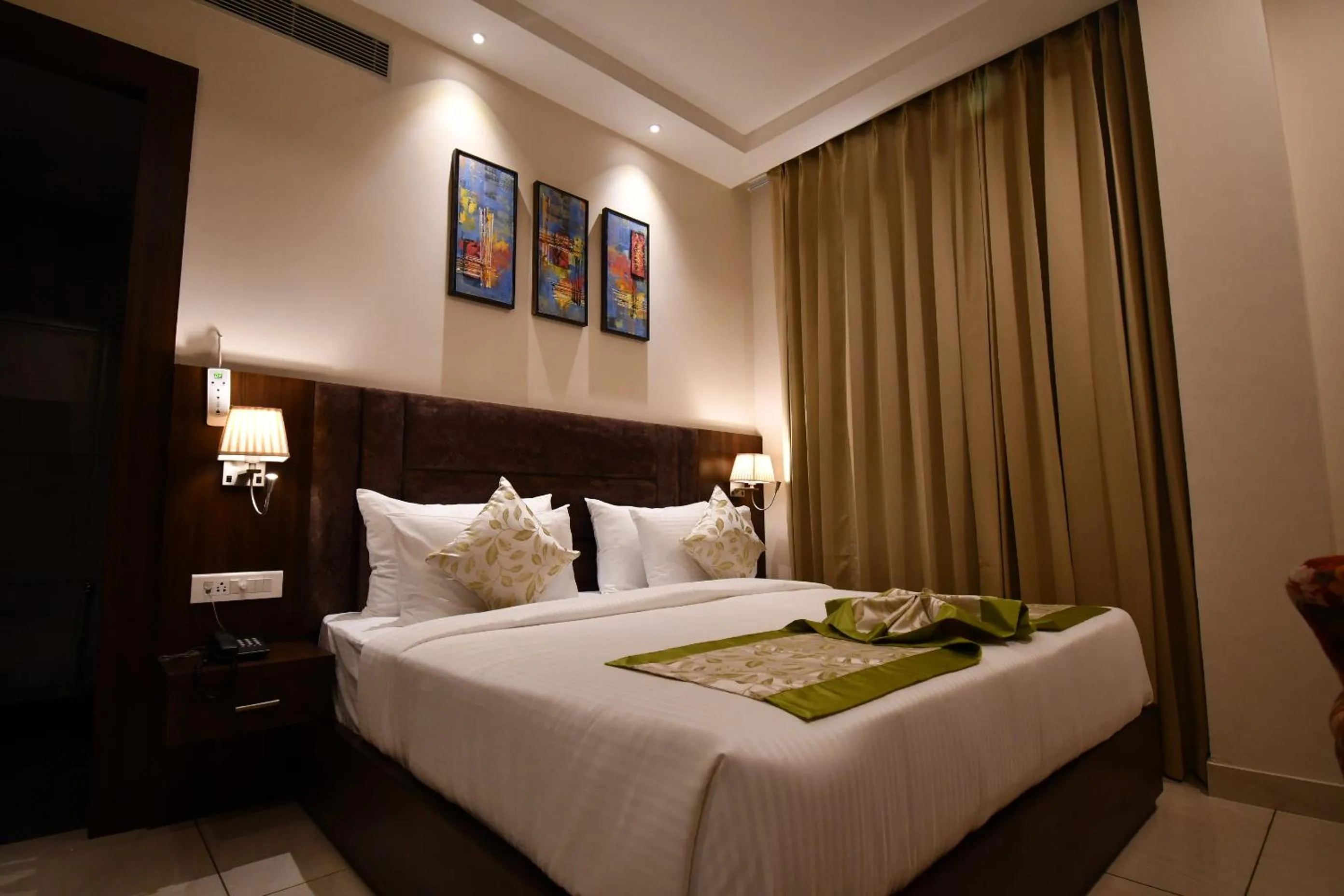 Bed in Hotel Ramaya Inn