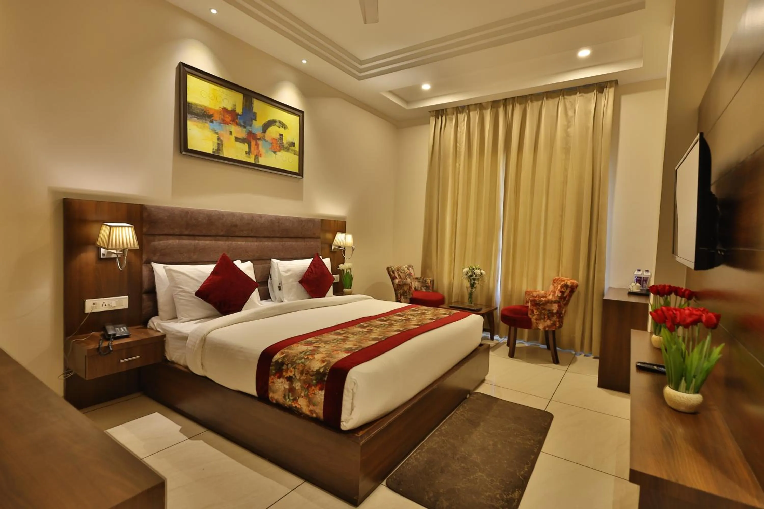 Photo of the whole room, Bed in Hotel Ramaya Inn