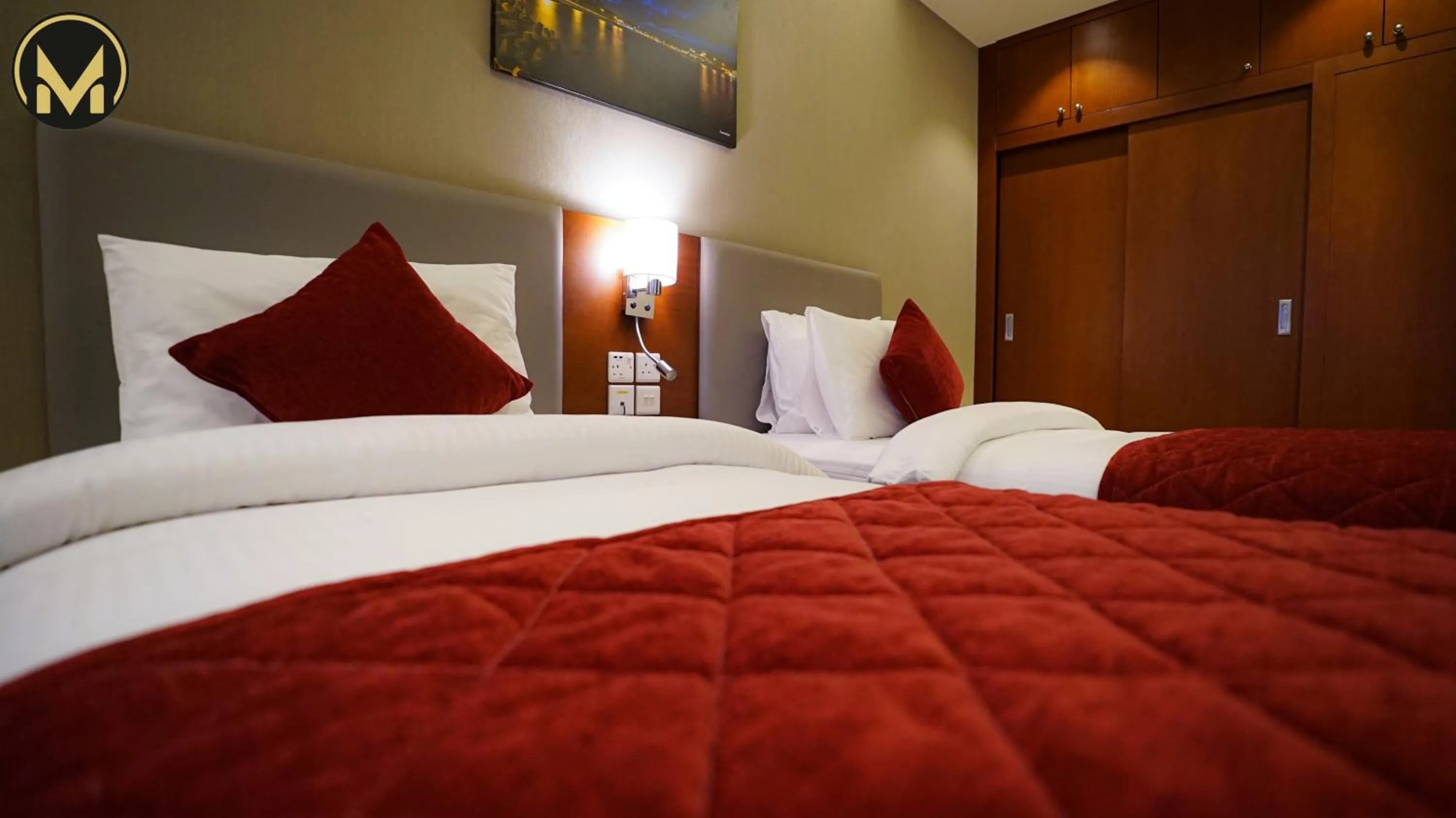 Bed in Muscat Express Hotel