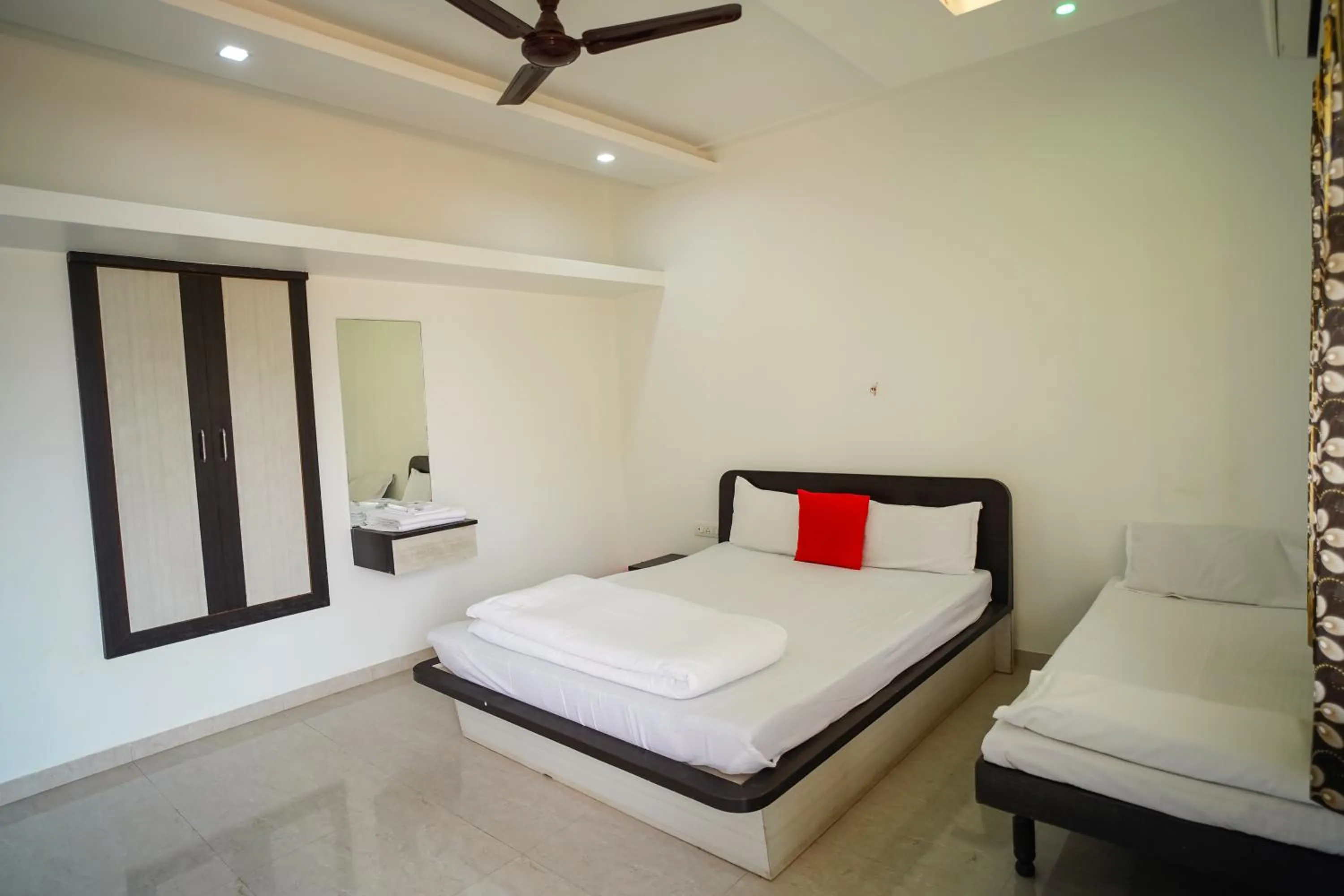 Bed in VIRASAT RESORT
