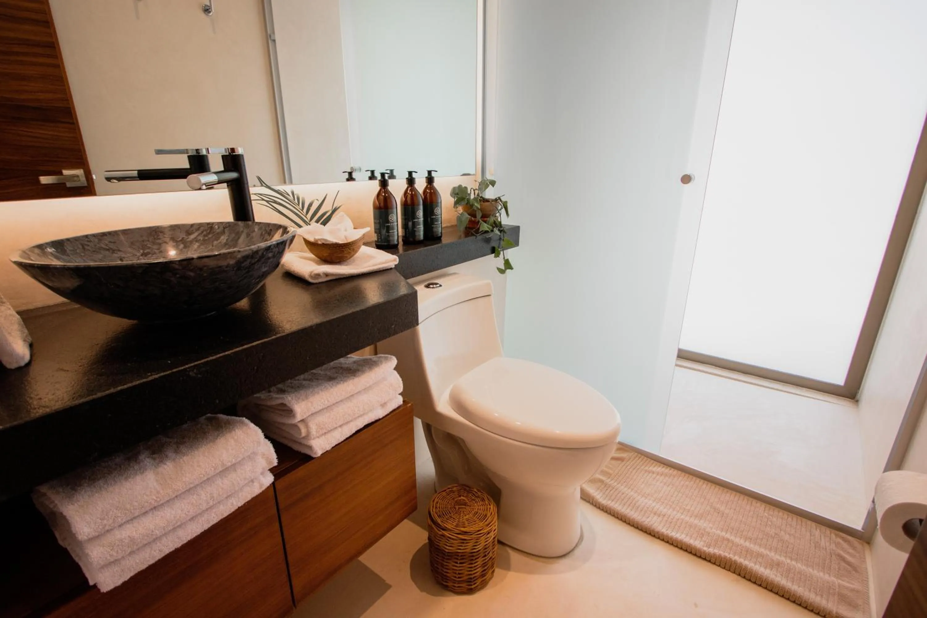 Bathroom in Spacious 2BR apt · Wide balcony w/tub & Yoga deck