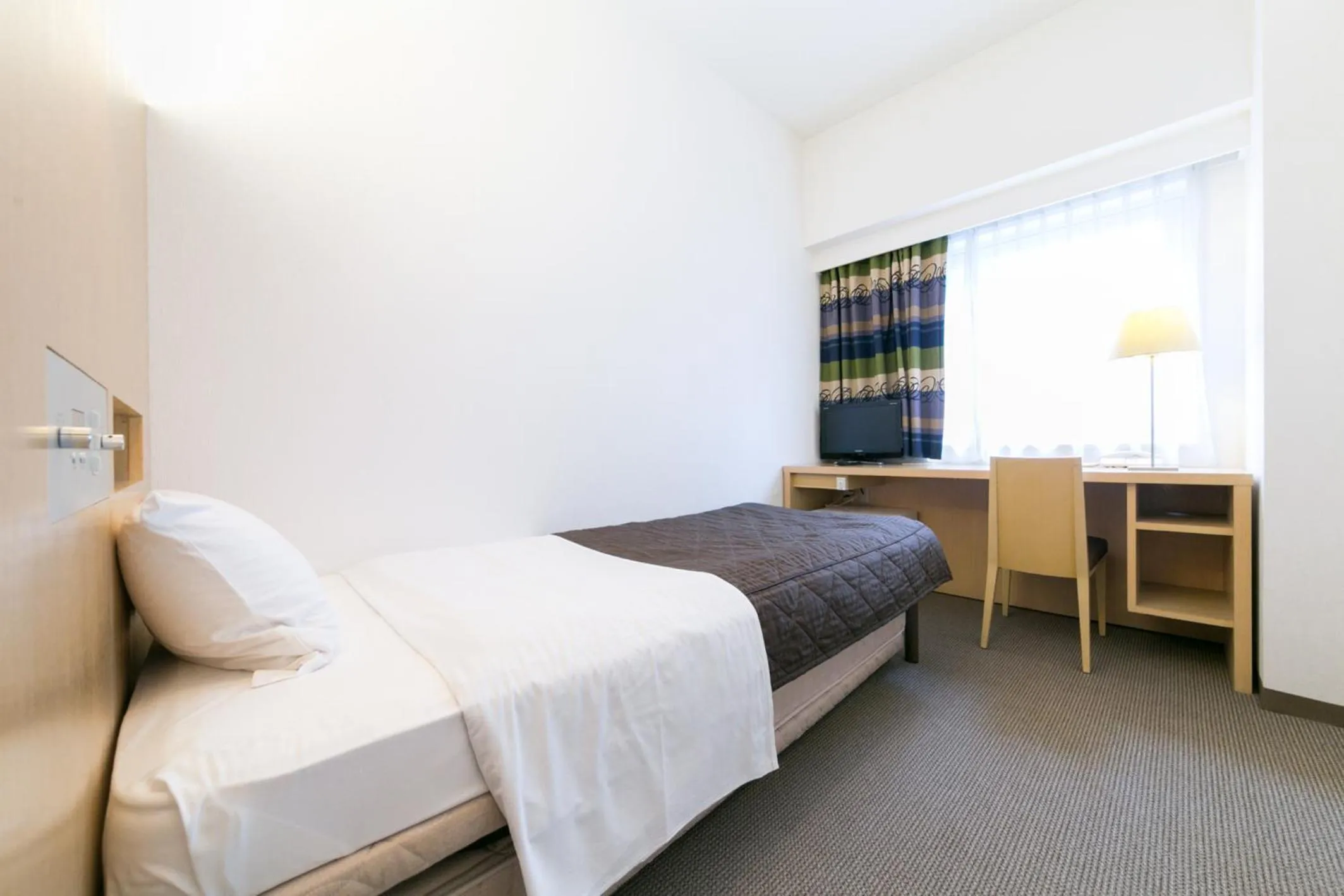 Bed in Pearl Hotel Kayabacho