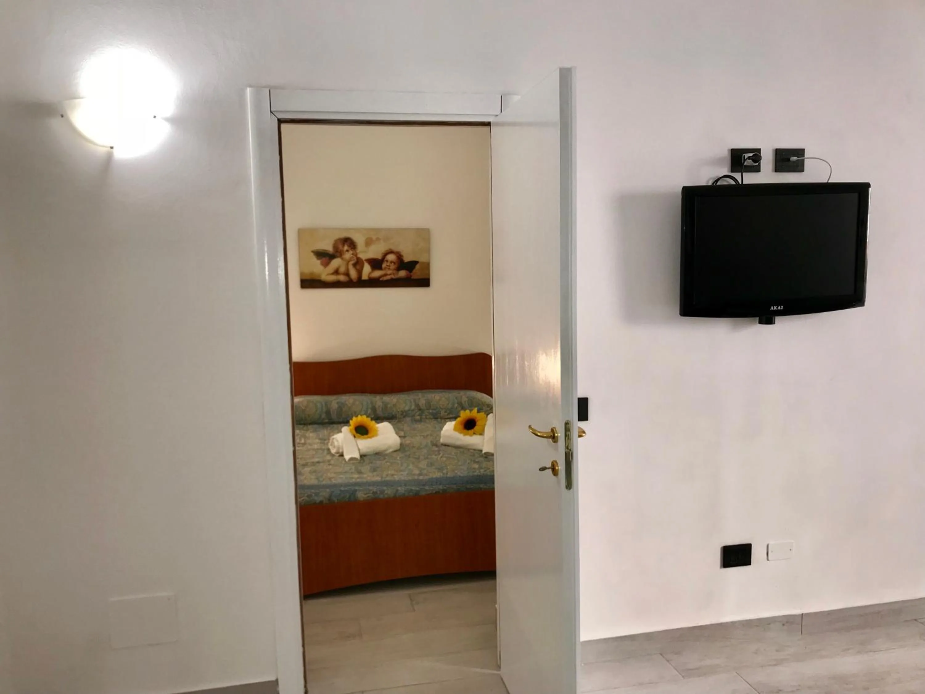 Communal lounge/ TV room, Bed in Casa Longo