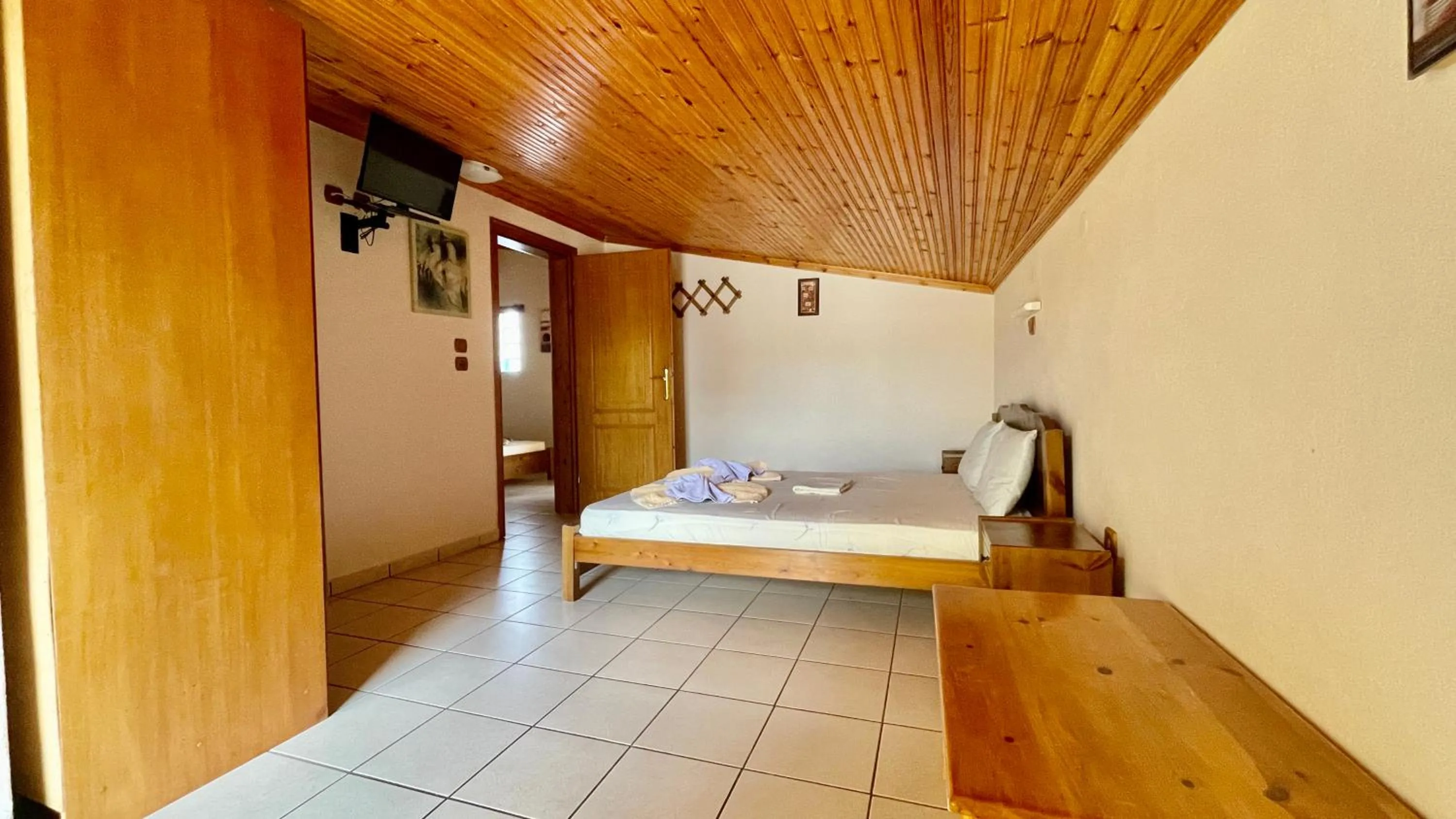 Bed in Hotel Karagiannis