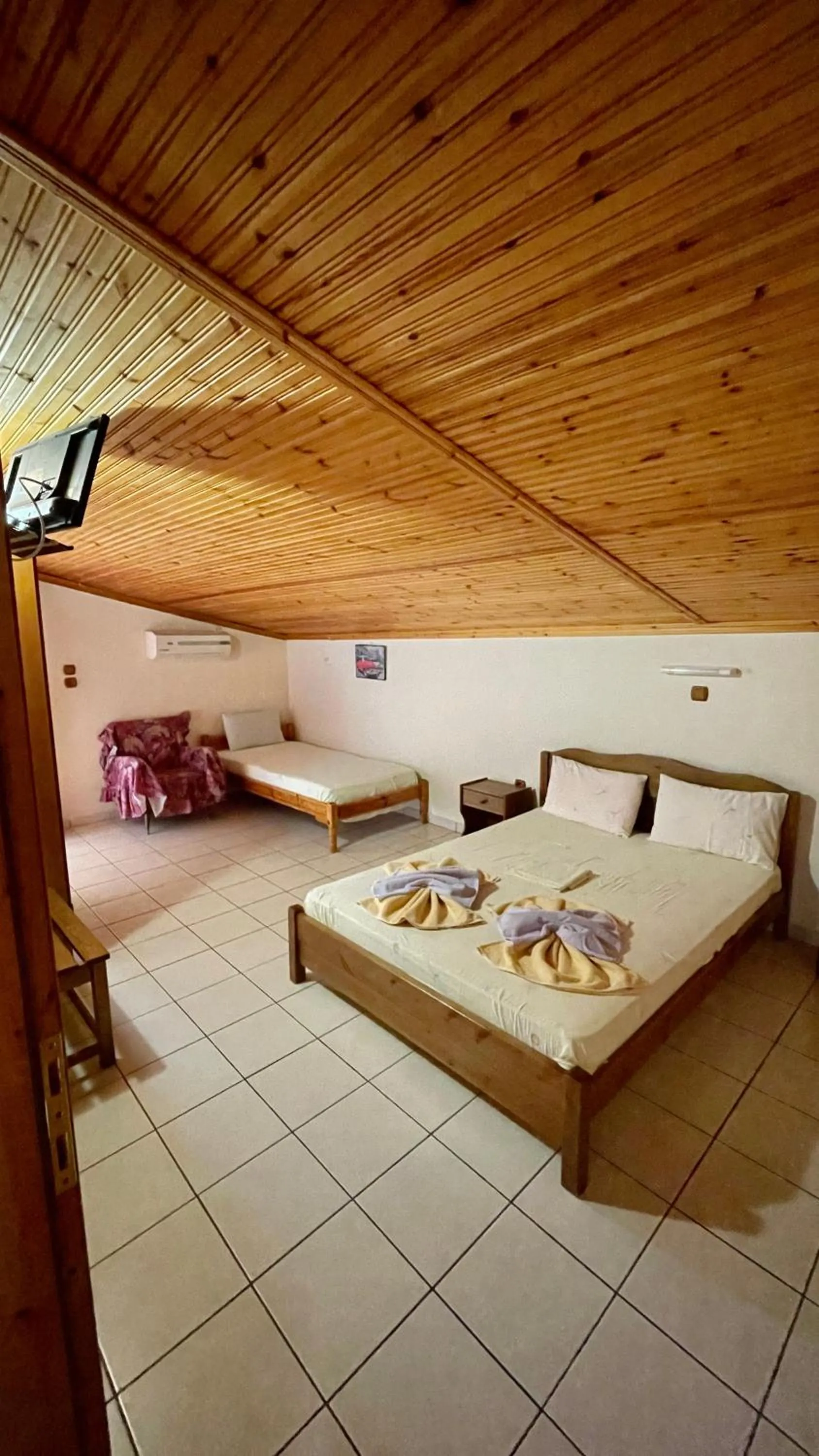 Bed in Hotel Karagiannis