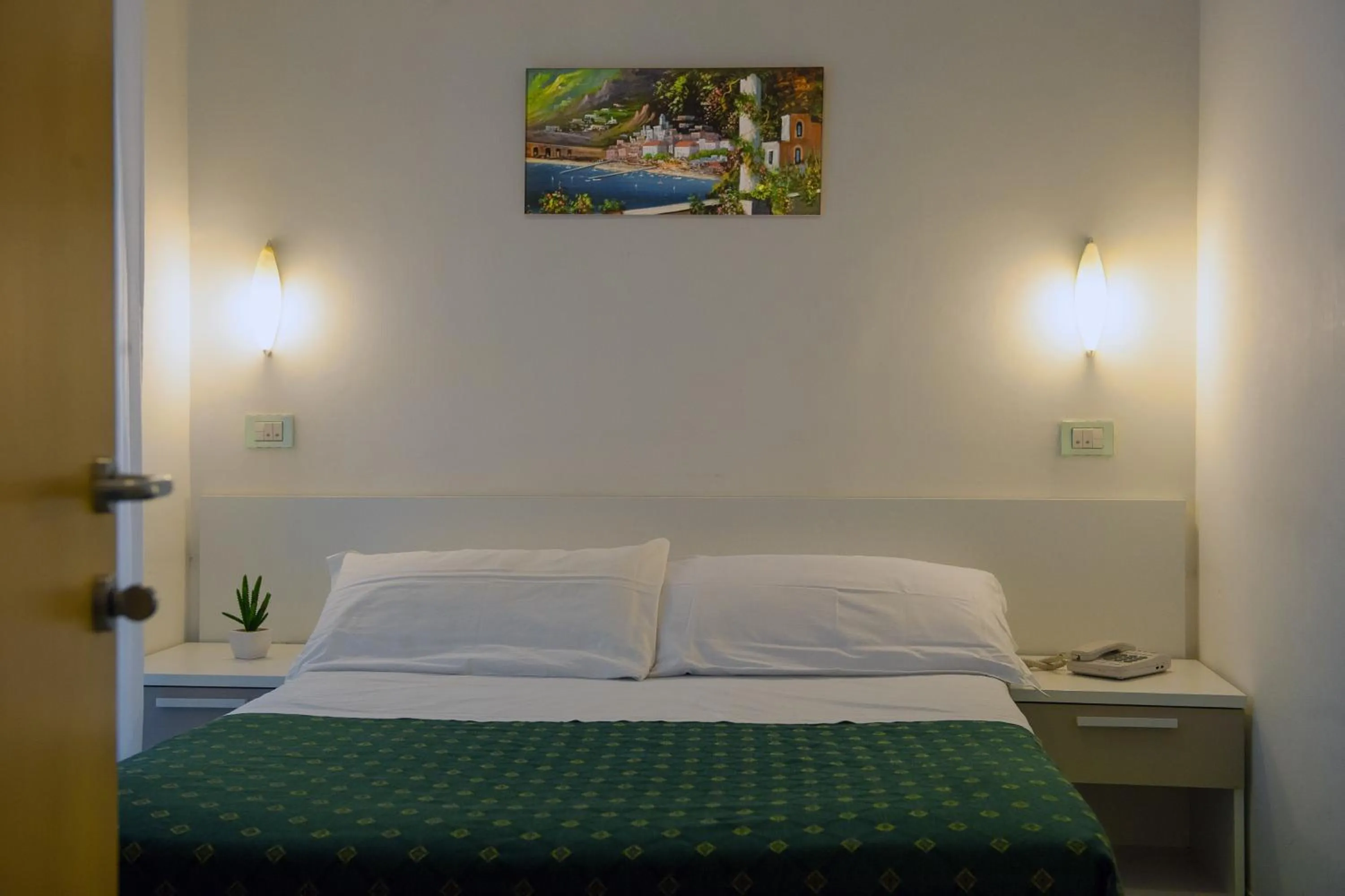 Bed in Hotel De Rosa