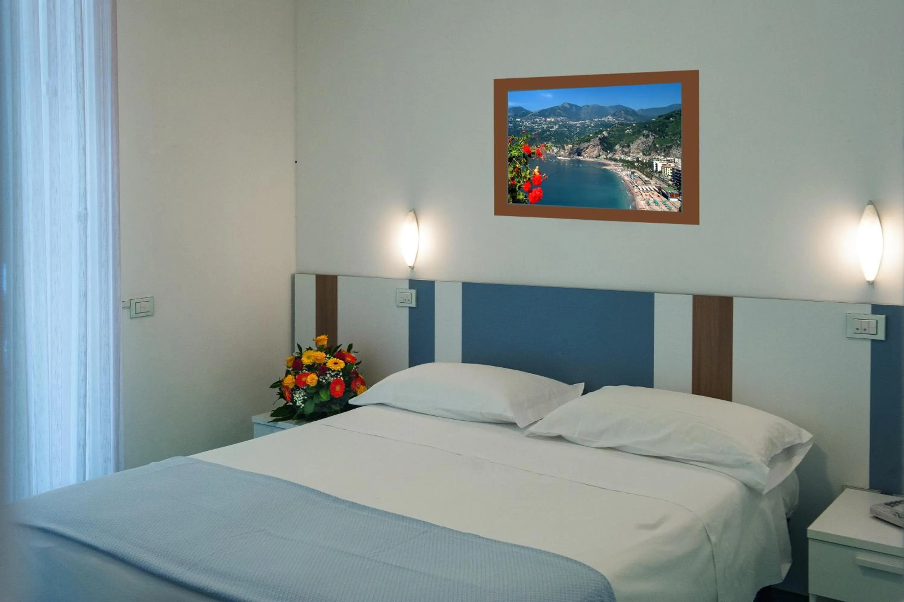 Bed in Hotel De Rosa