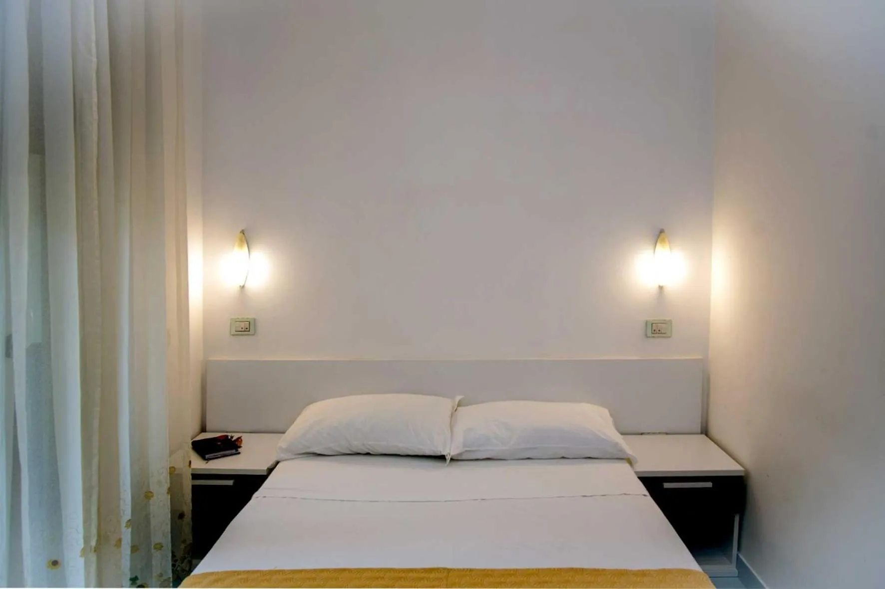 Bed in Hotel De Rosa