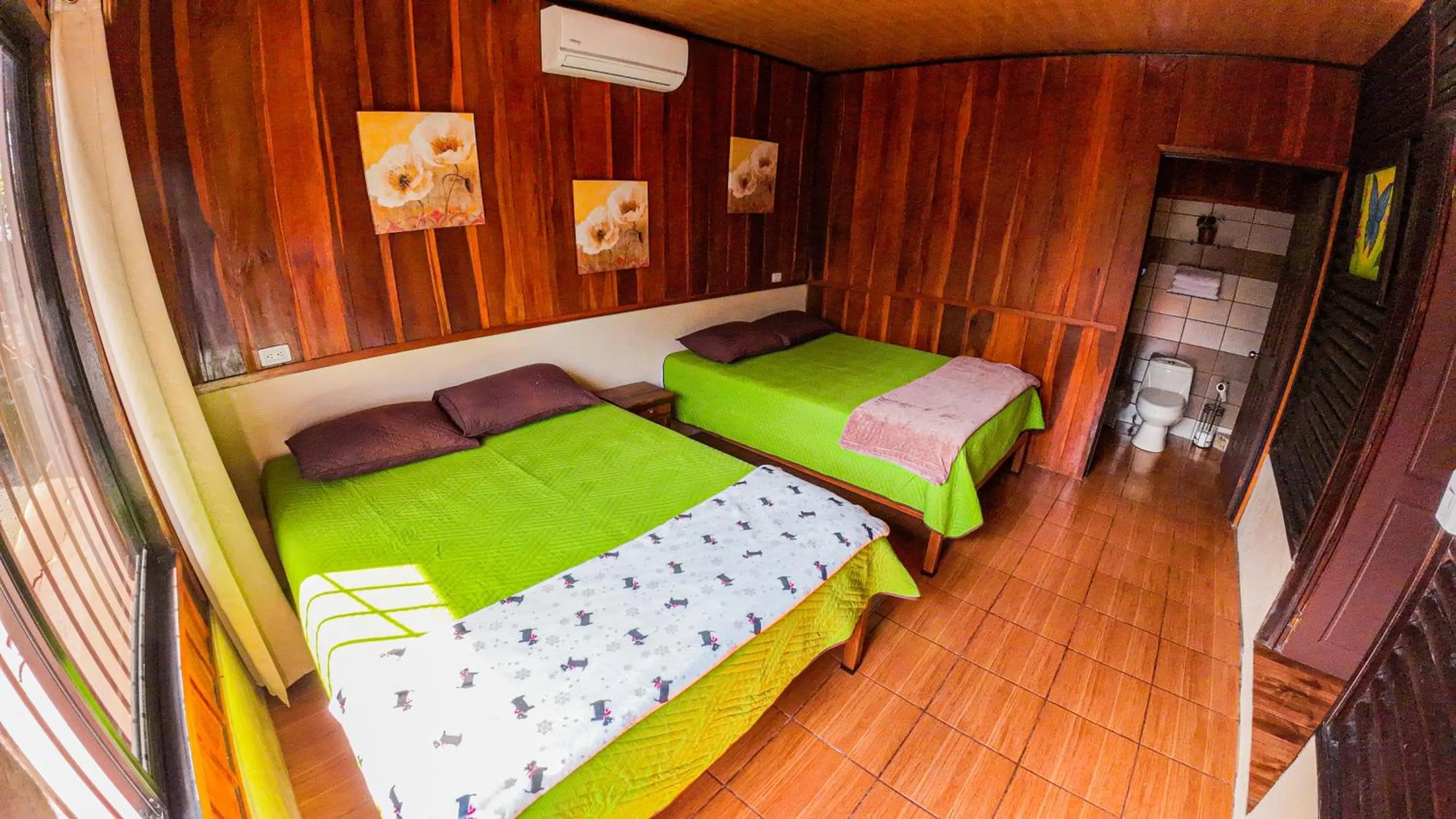 Bed in Bungalows Las Iguanas Arenal Volcano