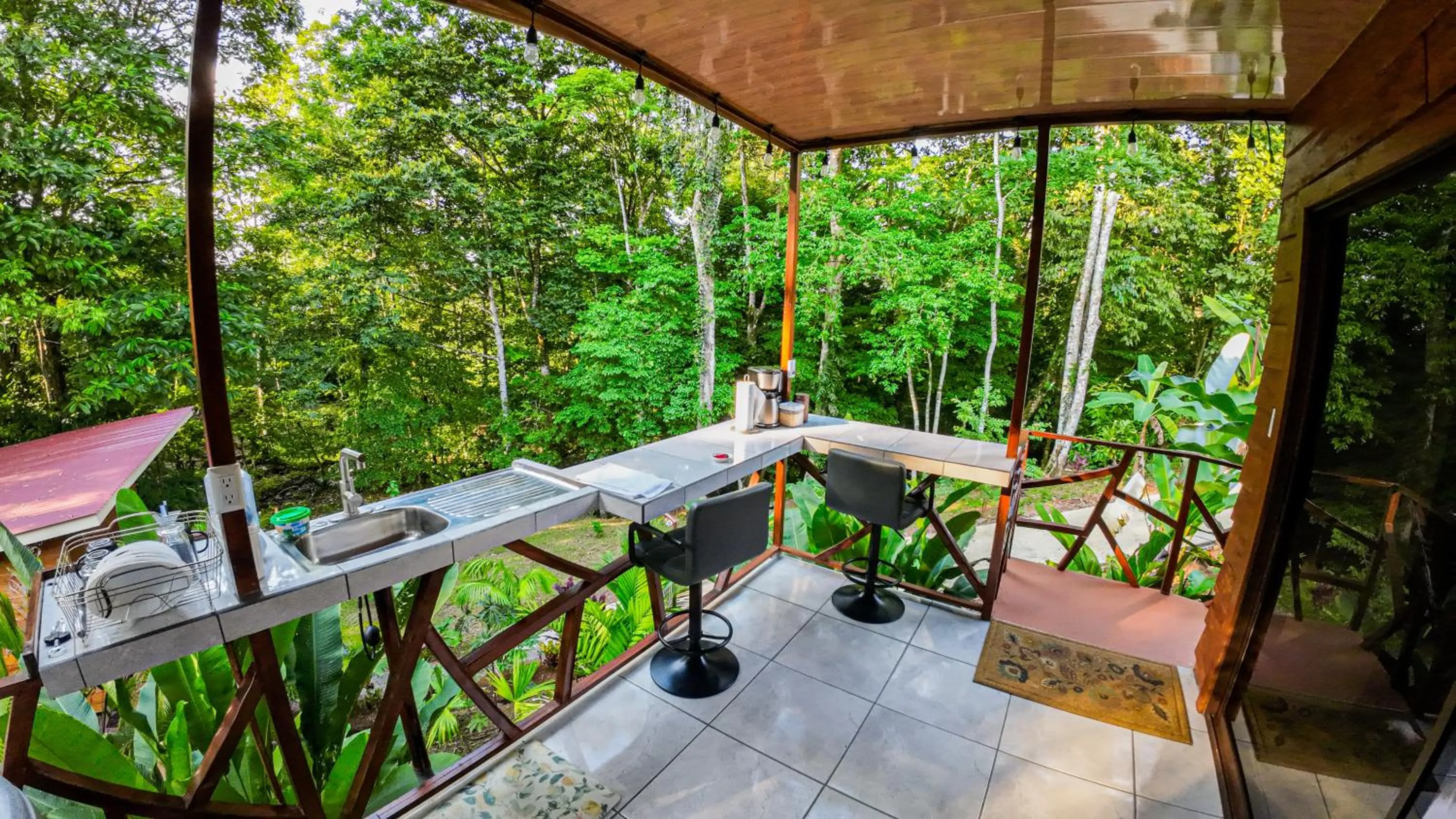 Seating area in Bungalows Las Iguanas Arenal Volcano