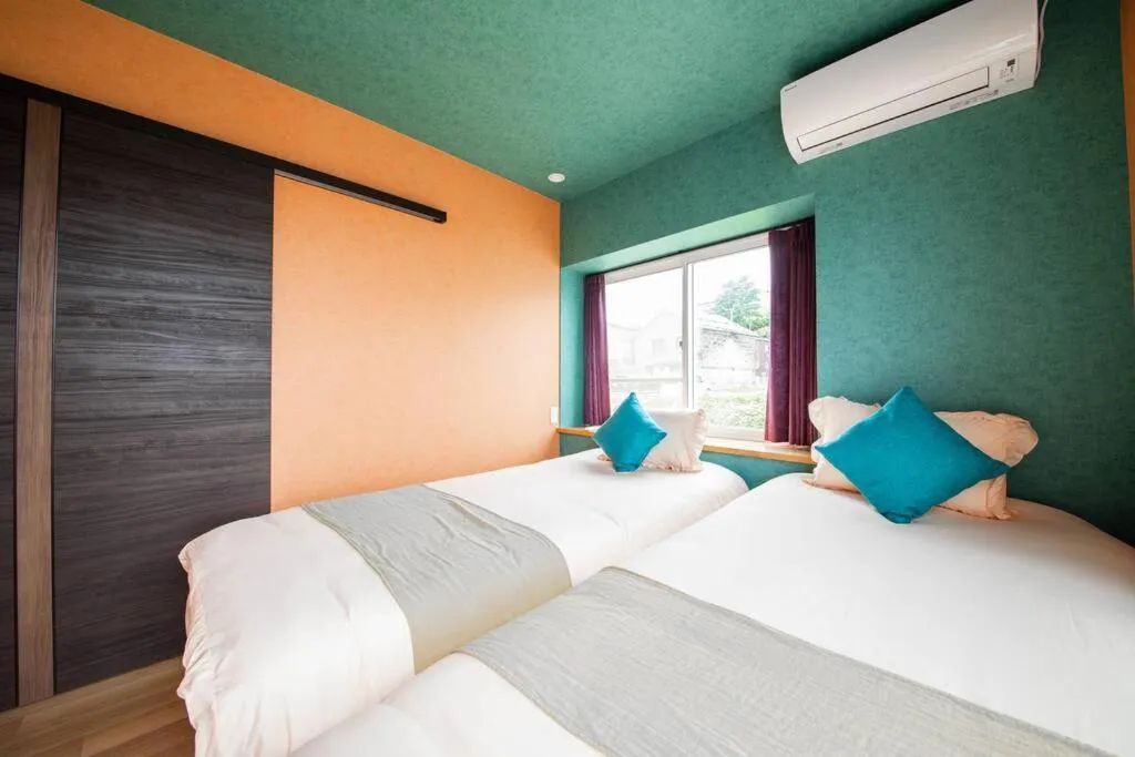 Bed in THE BEEHIVE AIOI