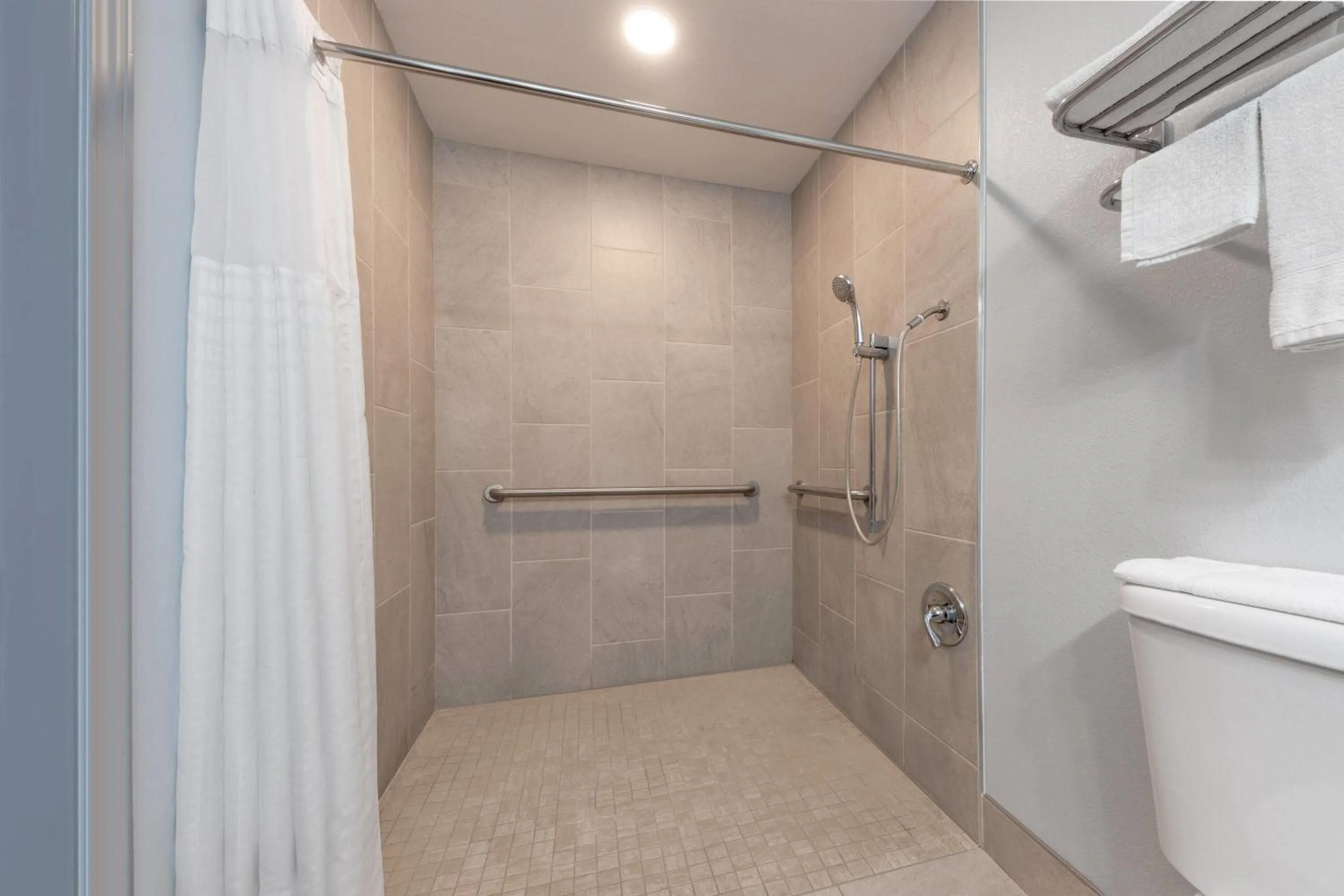 Shower in Super 8 by Wyndham Fort Worth Entertainment District