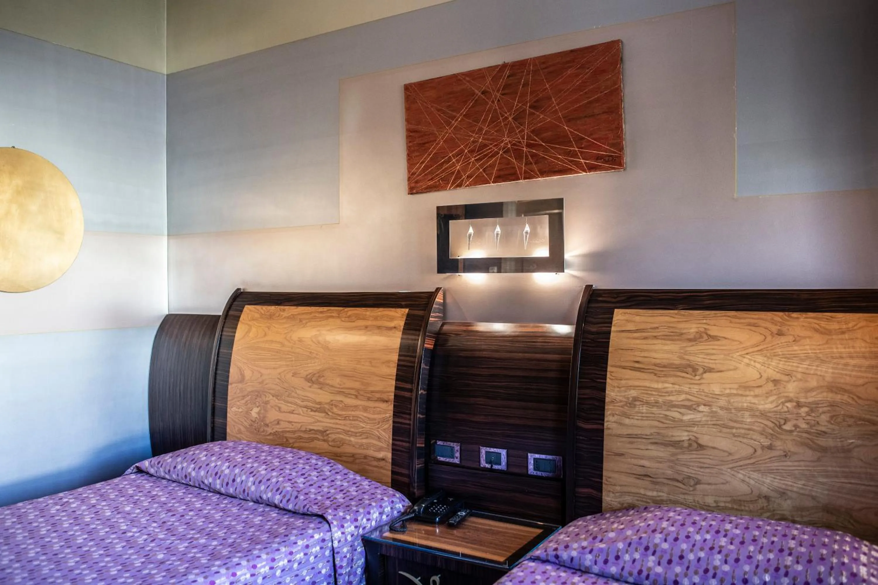 Bed in Hotel Garibaldi