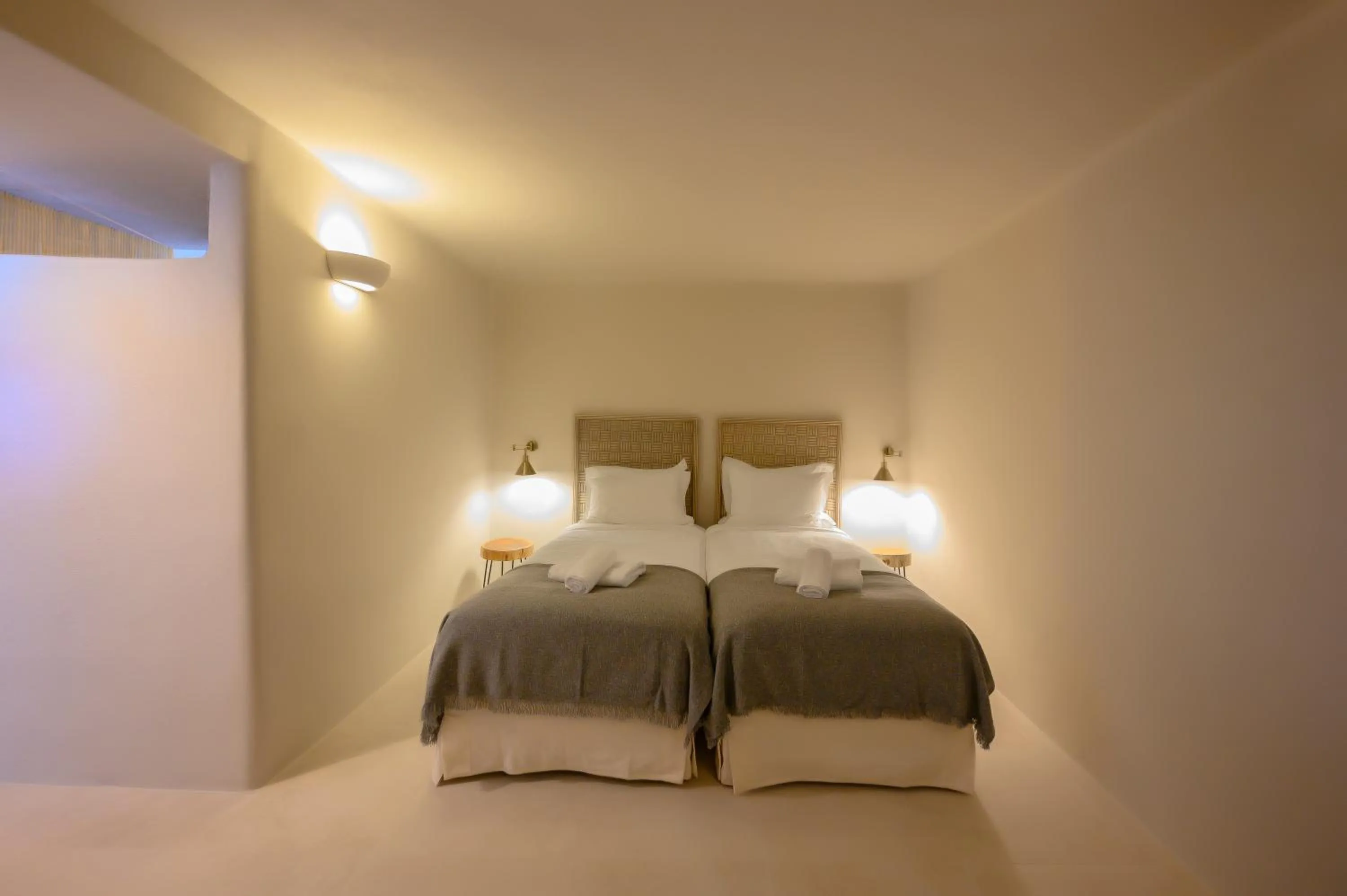 Bed in Elements Cave Suites