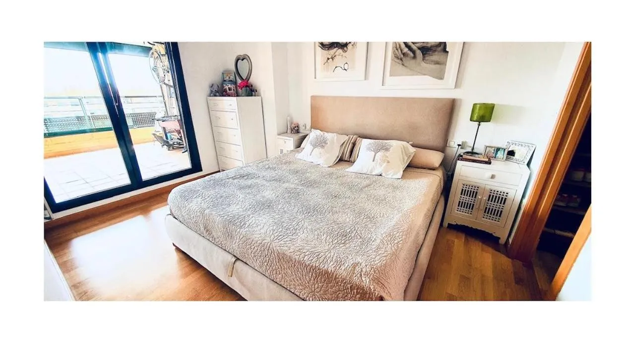 Bed in Lovely penthouse condo with pool