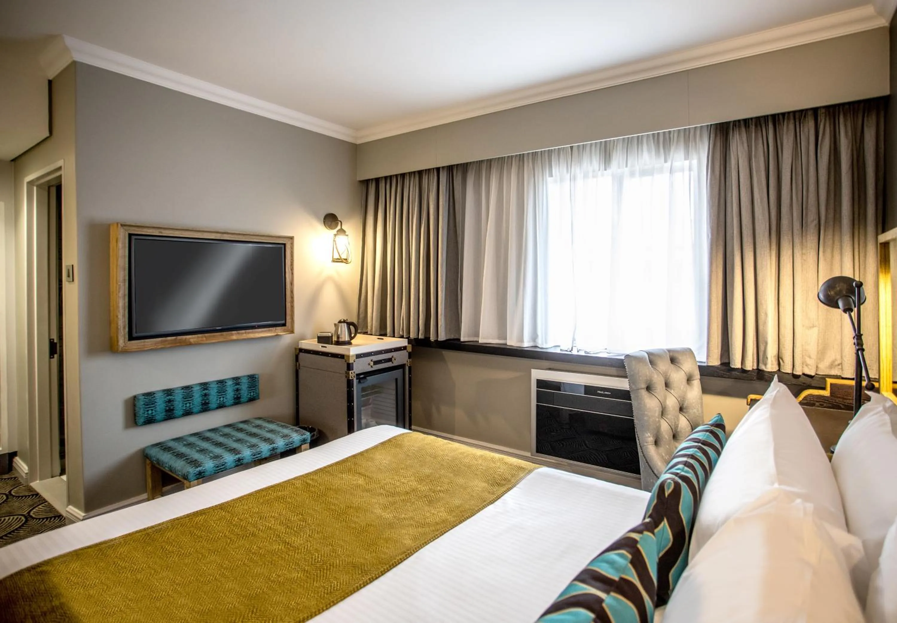 Photo of the whole room, Bed in Southern Sun Ridgeway Lusaka